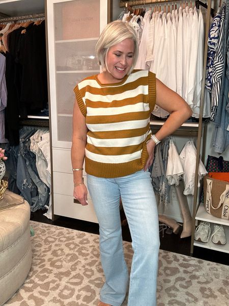 I love this brown and cream striped sweater. I love that it’s sleeveless so it’s perfect for layering over a white button down. Code WANDA20 saves you 20%.

Jeans code WANDAXSPANX saves 20%

#LTKmidsize #LTKplussize #LTKSeasonal