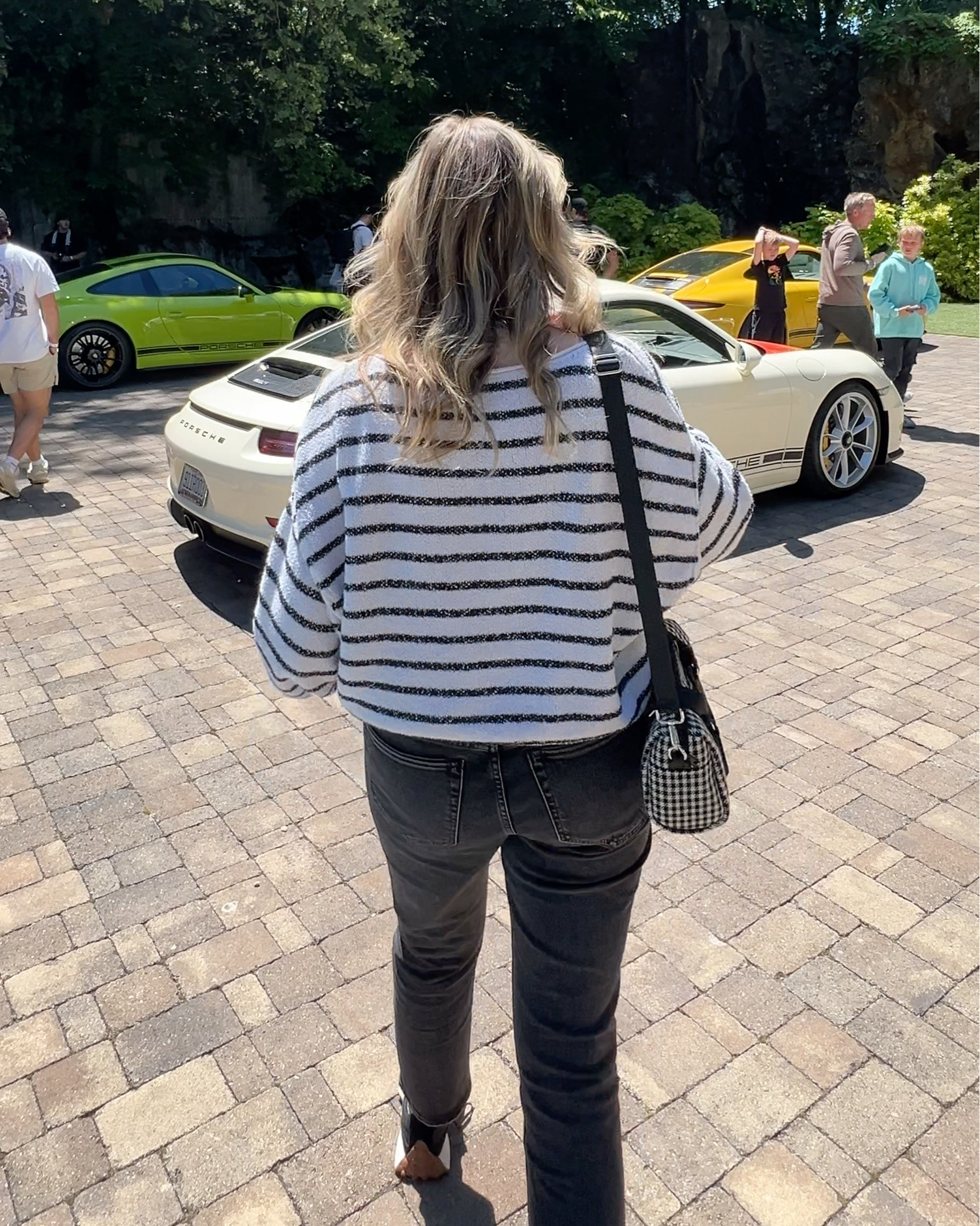 Nothing but sunshine and Porsches this weekend at Plática car event in Knoxville, TN. Always nice to admire the sleek design and beauty of these cars, especially the 911R featured this year  

Wearing a medium weight casual sweater layered over a basic tank and dark cropped jeans. These New Balance are a comfy favorite shoe for walking around any type of event  

#LTKTravel