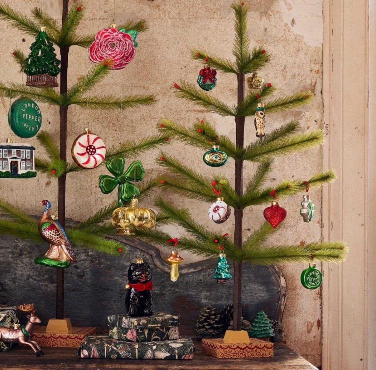I cannot get enough of this tree! A modern version of an antique feather tree. How cute would this be with shiny brites! 

#LTKHoliday #LTKHome #LTKSeasonal