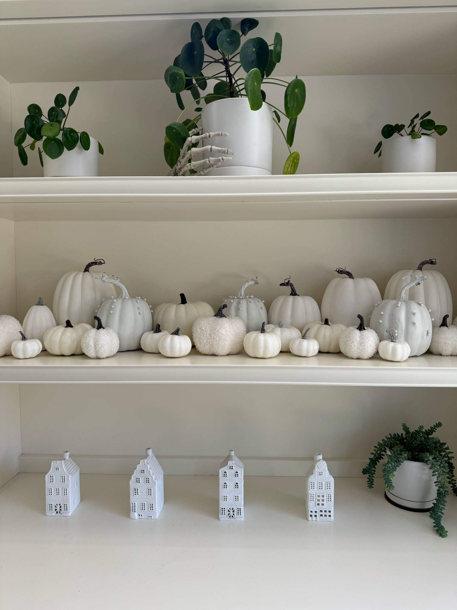 A full view of my DIY stud pumpkins on my monochrome bookshelf 🤍

Halloween decor, home, diy, craft, fall decor, easy crafts

#LTKSeasonal #LTKHome