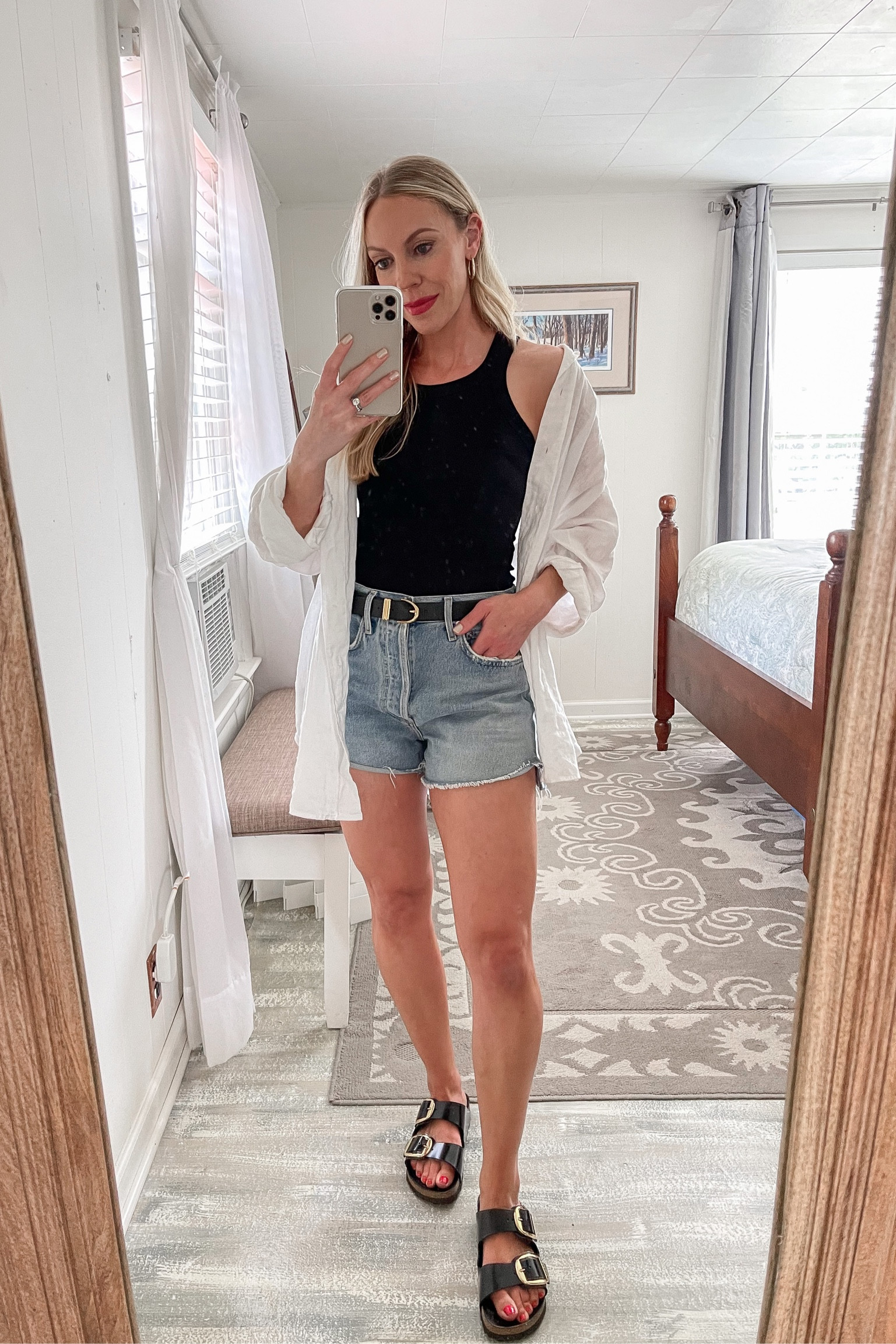 Casual summer outfit, white linen shirt, cutoff denim shorts, black tank top, Birkenstock big buckle sandals 

#LTKstyletip #LTKshoecrush #LTKunder50