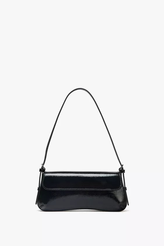 Shoulder bag with flap. Patent effect. Adjustable shoulder strap. Magnetic closure.Height x Lengt... | Zara UK