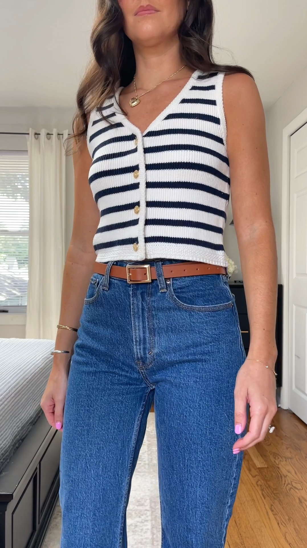 Summer outfit! Bought this tank to wear during the week of 4th of July but could be styled for the office, a party, dinner date, etc! Wearing size XS in the top and I’m 5’7”. True waist size 25 in the jeans! 

#LTKVideo #LTKSummerSales #LTKSeasonal