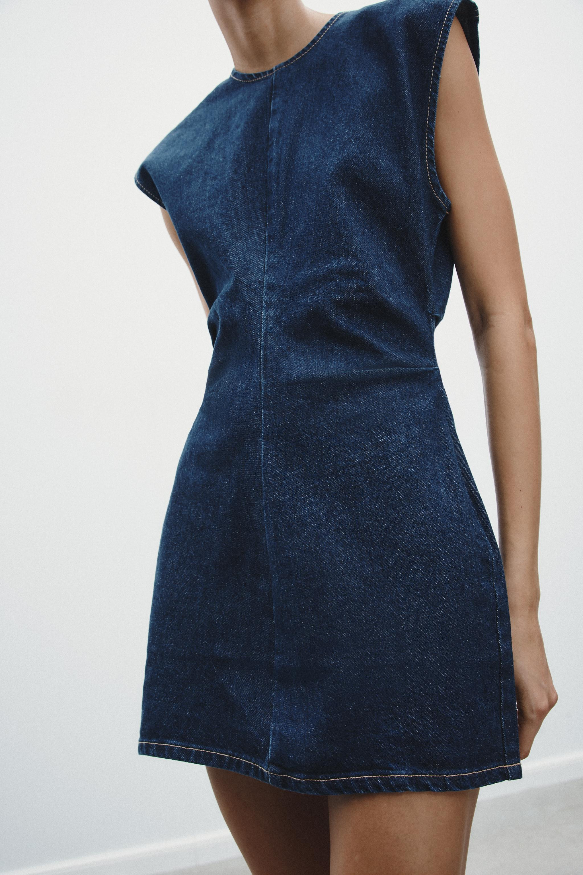 Short sleeveless dress with a round neck. Gathered detail at the waist. Zip fastening at the back... | Zara UK