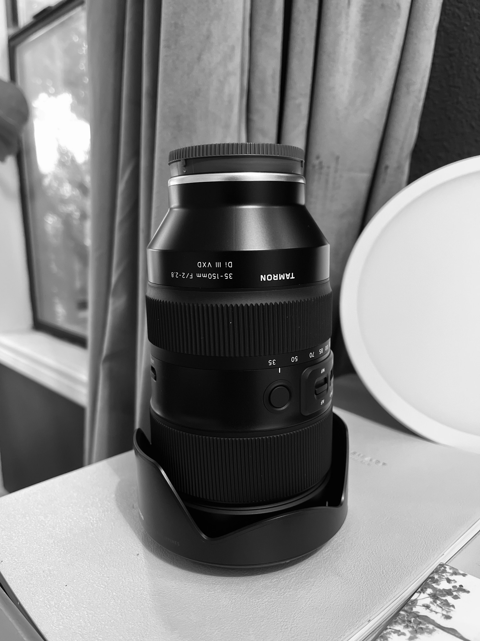 My 70-200 decided to stop focusing; so I'm trying something different. Until I found this 35-150, 1 didn't even know a lens like this existed. It's heavy (a lot shorter than a 70-200 though), but it just might cover all of my wedding day needs!