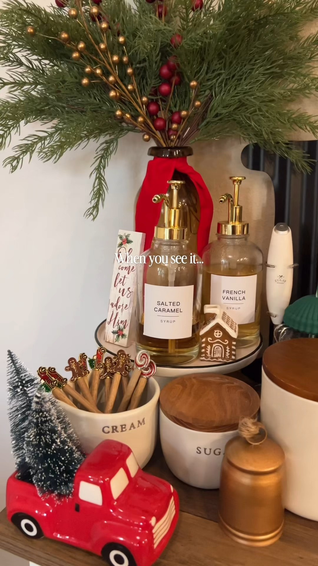 Can you spot it? My hubby knows a guy 🤣🤭🥰

Side note: the arch I painted a few months ago brings all this Christmas decor together so nicely 🥲, I’m glad we took a few hours of our day to paint it — another corner that I love so much 😭
.
.
#coffeebardecor #christmasdecor #bearista #dupe #christmas2025 
#christmasapartmentdecor #homedecorforchristmas #christmaskitchendecor #christmasdecorations #oldchristmas #nostalgicchristmas #vintagechristmas #consoletablestyling #christmasishere #christmasinspo #christmasmagic #traditionalchristmas #90schristmas 

Search 🔍: Coffee Bar Christmas Decorations, Christmas old style, vintage Christmas decor, festive Christmas decor, green Christmas decor ideas, Red Christmas decor, cedar garland, kitchen decor inspiration for Christmas #hobbylobby #hobbylobbychristmas

#LTKHoliday #LTKSeasonal