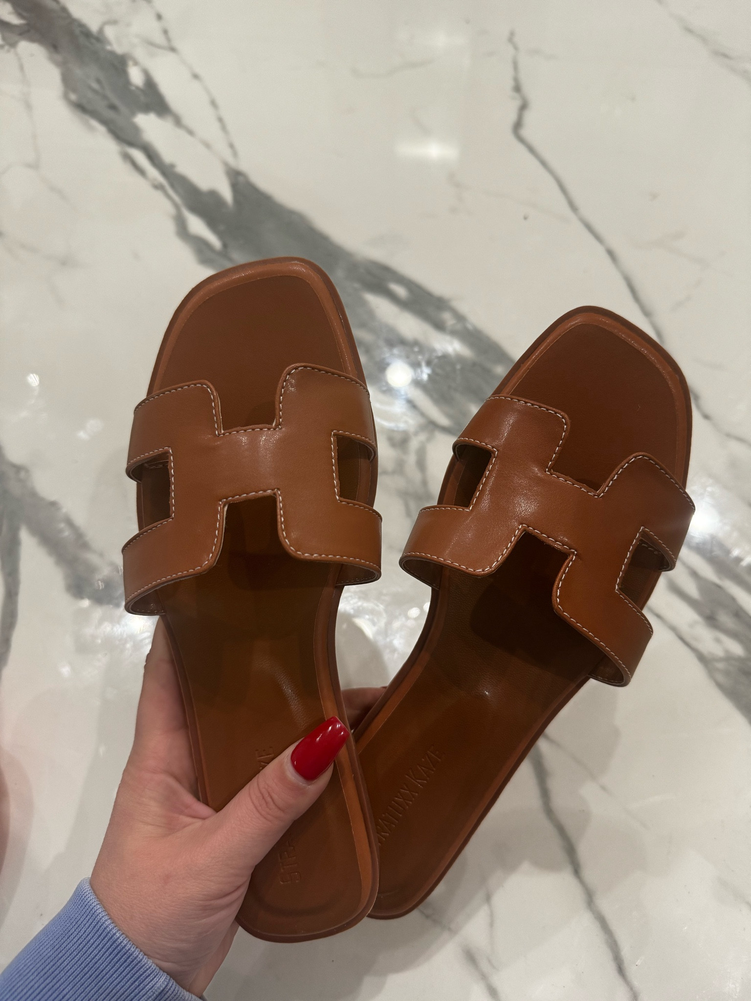 LOVE these sandals so much!!! I have them in black as well but they come in tons of colors and are under $40!!! Such a steal and so comfy!!!! #shoes #sandals #slides 

#LTKshoecrush #LTKfindsunder50 #LTKstyletip