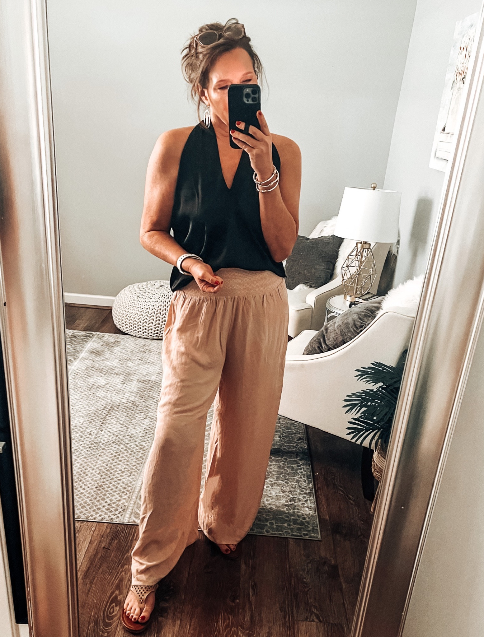 New Summer Nights Collection drop with Oink Lily. The halter neck top I am wearing can be worn like I’m wearing it or twisted on the front. Fits tts use code MAY20 to get 20% off your order. Smocked waist pants are also from Pinky Lily, fits tts, styled with embellished thong sandals from Amazon 

Summer outfit, date night , weekend outfit, vacation outfit, wide leg pants, dressy tops, summer tops, fashion over 40

#LTKsalealert #LTKunder50 #LTKstyletip