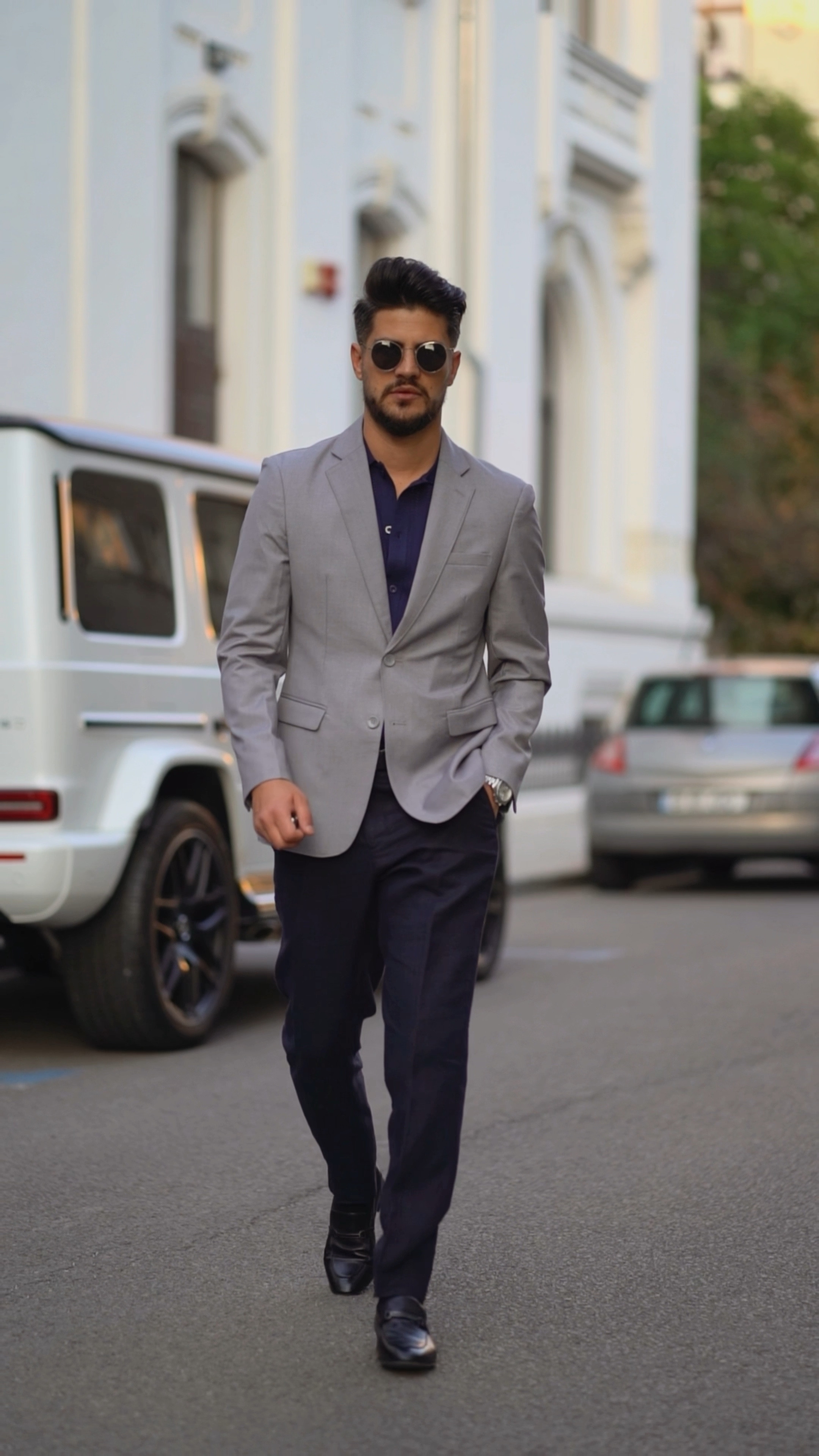 Smart-casual vibes with a grey blazer, navy polo, and tailored navy trousers. Finished off with black loafers, this look strikes the perfect balance between polished and relaxed. 🕶️

#LTKMens #LTKFallSale #LTKParties