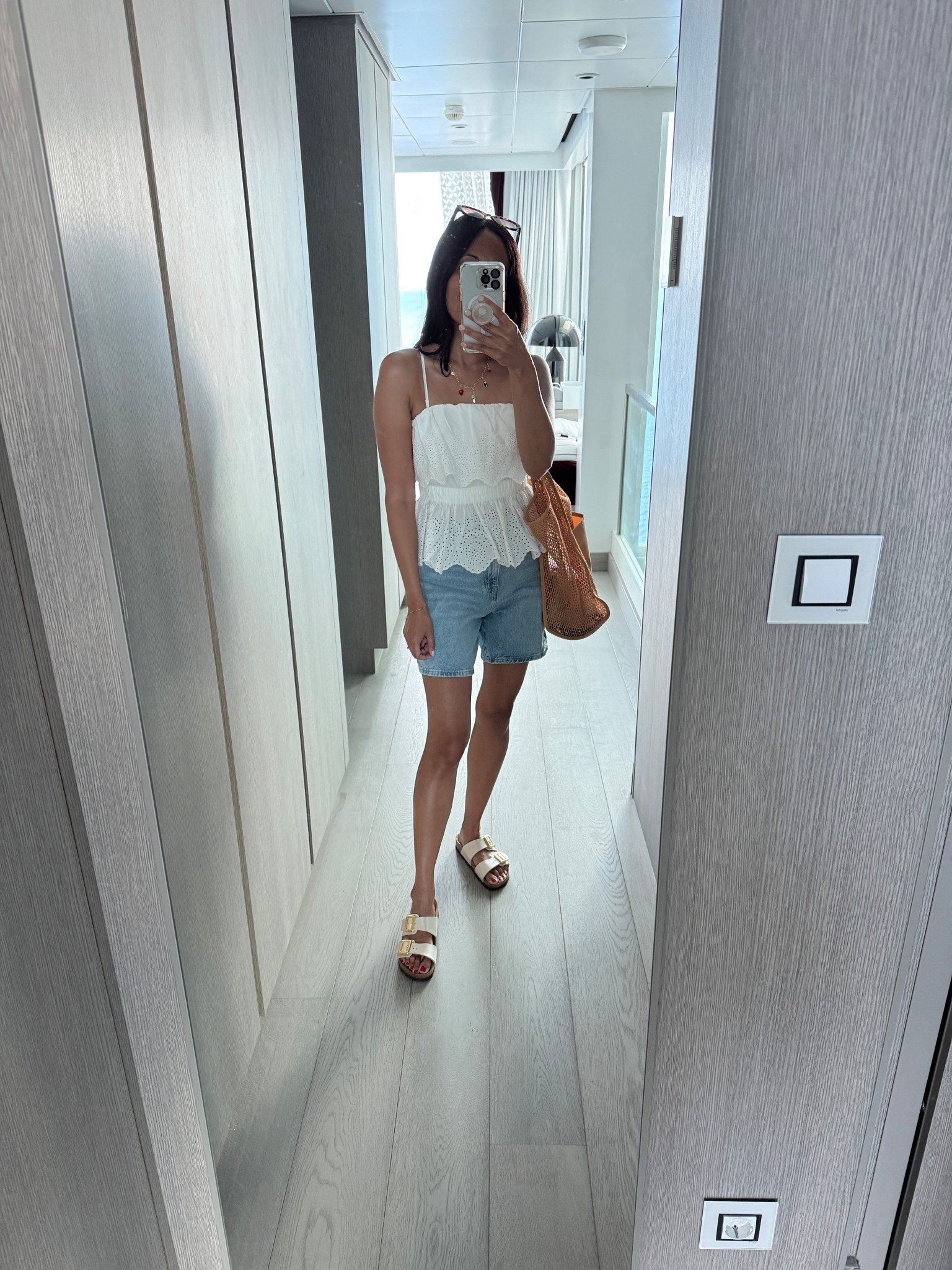  Vacation outfit. Cruise outfit. Resort wear. Resort outfit. 
Top has removable adjustable straps. 
Longer length denim shorts. 
Slide sandals. 
Tote bag. 
Sunglasses. 
Charm necklace  

#LTKOver40 #LTKTravel #LTKFindsUnder100