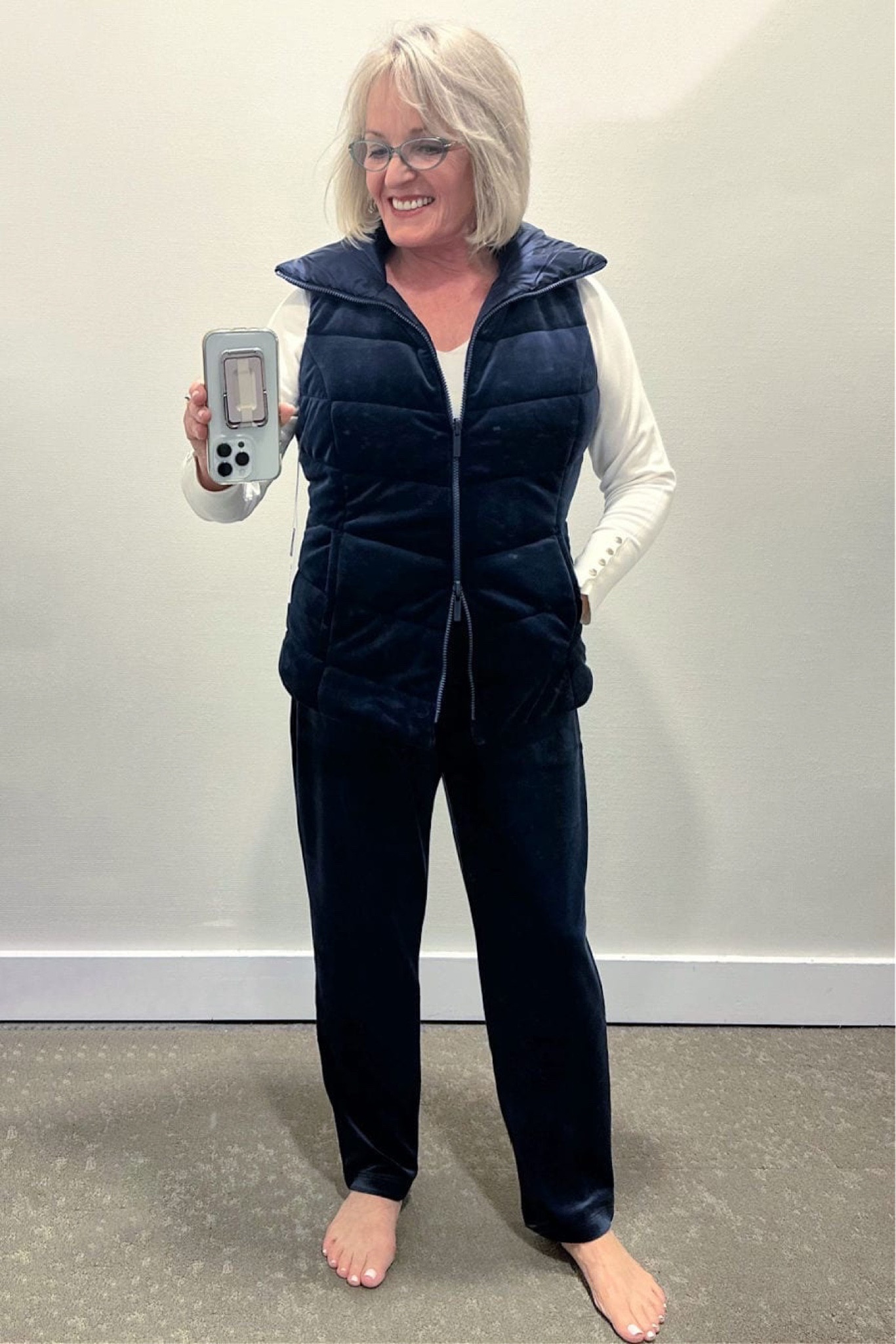 Chicos is having a sale, and many of their pieces are 25% off, like this Zenergy velour set. It’s so soft and cuddly, and comes in navy,  black, deep forest, or a rich Merlot. The vest is reversible and has pockets inside and out with channel quilting, and princess seaming, which is very slimming. The velour pants are super stretchy and machine washable. They have a straight leg and zippered pockets. I wore a button cuff V-neck pullover to complete the outfit.

#Chicos #ChicosFashion #ChicosHolidayFashion #HolidayOutfit #HolidayFashion #Fashion #Fashionover50 #Fashionover60

#LTKSeasonal #LTKstyletip #LTKHoliday