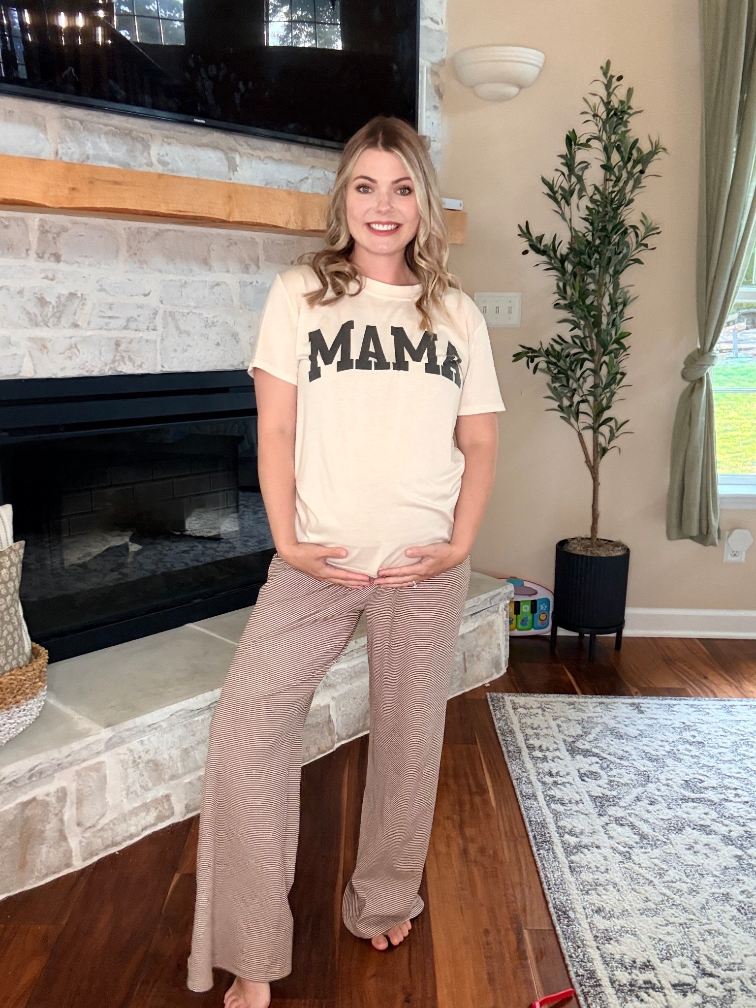 Cute Mama shirt paired with wide leg lounge pants. Fold over waist 
Brown stripes 
Amazon outfit
Wearing mediums 
Bump friendly 32 weeks pregnant 

#LTKPetite #LTKBump #LTKmomlife