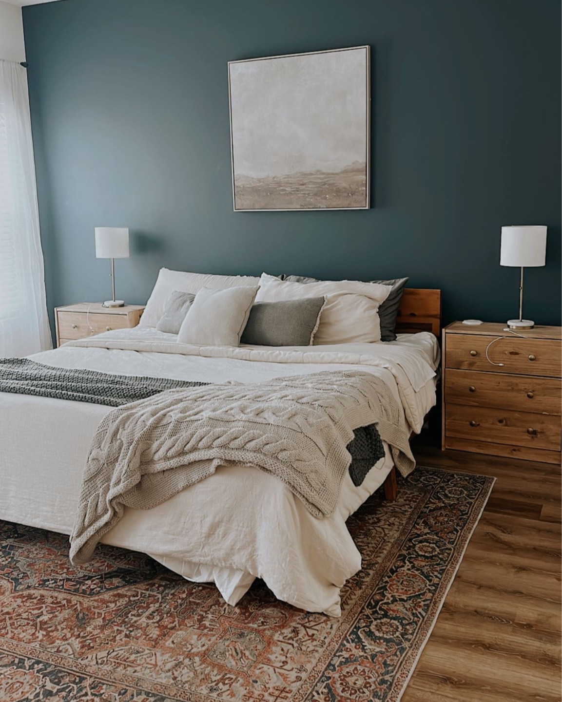 Really happy with how my Target score looks in our room! The studio Mc Gee art was 50% !! The end tables are a recent addition. They were an ikea project. I spent $150 on these total. I stained them and added new knobs. Love the result! 

#LTKFind #LTKhome #LTKunder100