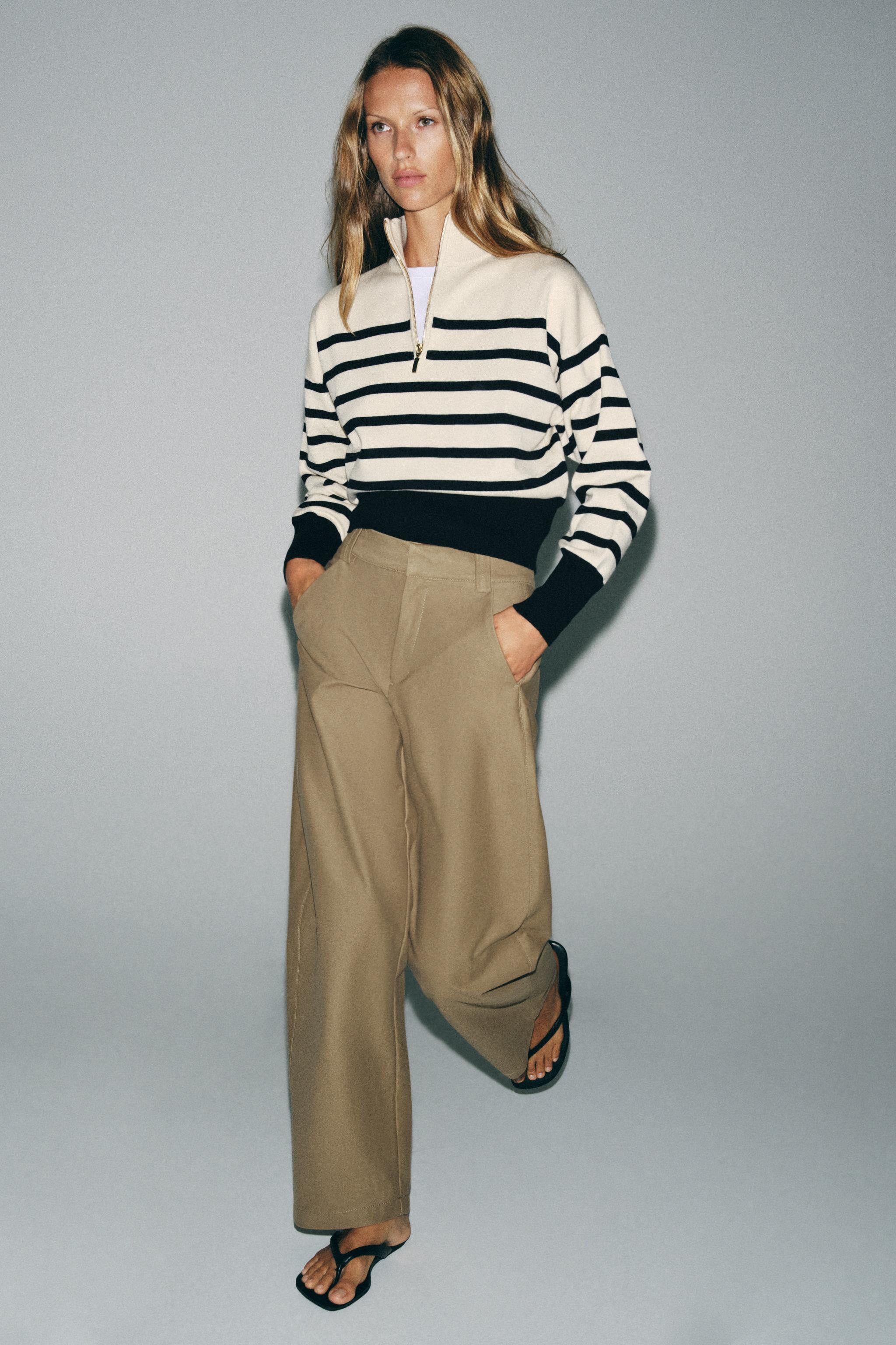 Jumper with a high neck and long sleeves. Front metal zipper closure. | Zara US