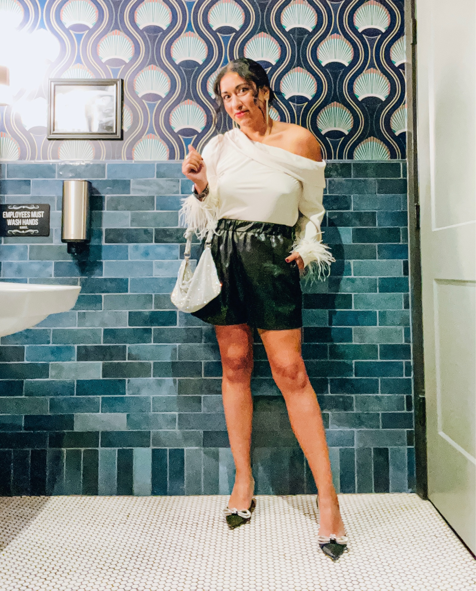 Girls night outfit
Feather top
Faux leather shorts
Bow heels 
Amazon bag


#LTKfindsunder100 #LTKGiftGuide #LTKstyletip