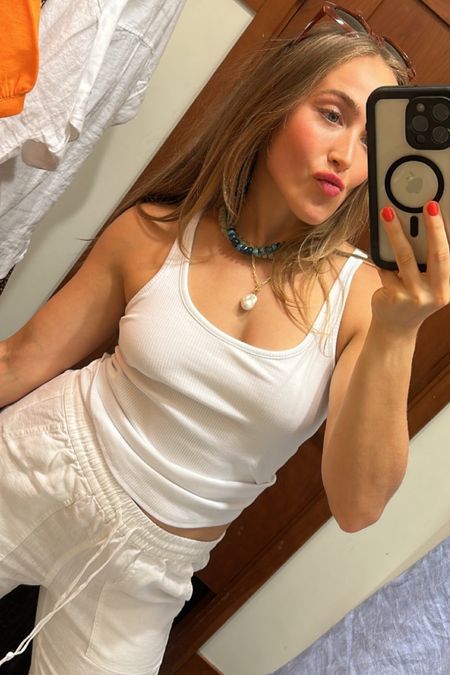 My absolute favorite white tank EVER. Built in bra makes all the difference. Not see-through. The fabric has the perfect amount of coverage and stretch! Use code SHOPNOW for 30% off 

#LTKworkwear #LTKunder50 #LTKstyletip
