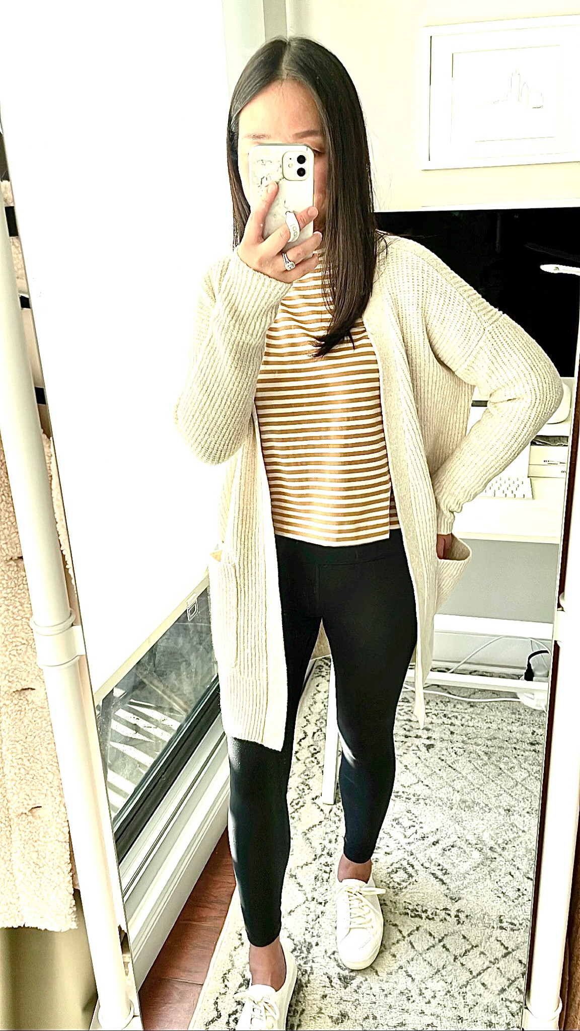 Amazon Fashion gifted cardigan in XS is an oversized fit.

AYR slushy tee in XS (get 20% off 2+ tees, use code FAB15 for an extra 15% off).

Favorite black leggings with 25" petite friendly inseam in XS.

Sneakers are stretchy but they run narrow. I took my usual size but I don't wear mine with socks.

#LTKunder50 #LTKstyletip #LTKunder100