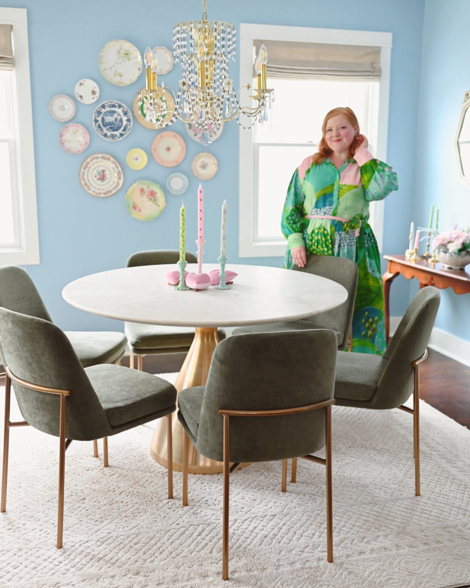 Grand Millennial Dining Room Decor

West elm dining table, green velvet dining chairs, Wayfair area rug, chandelier, plate wall, taper candles

#LTKHome