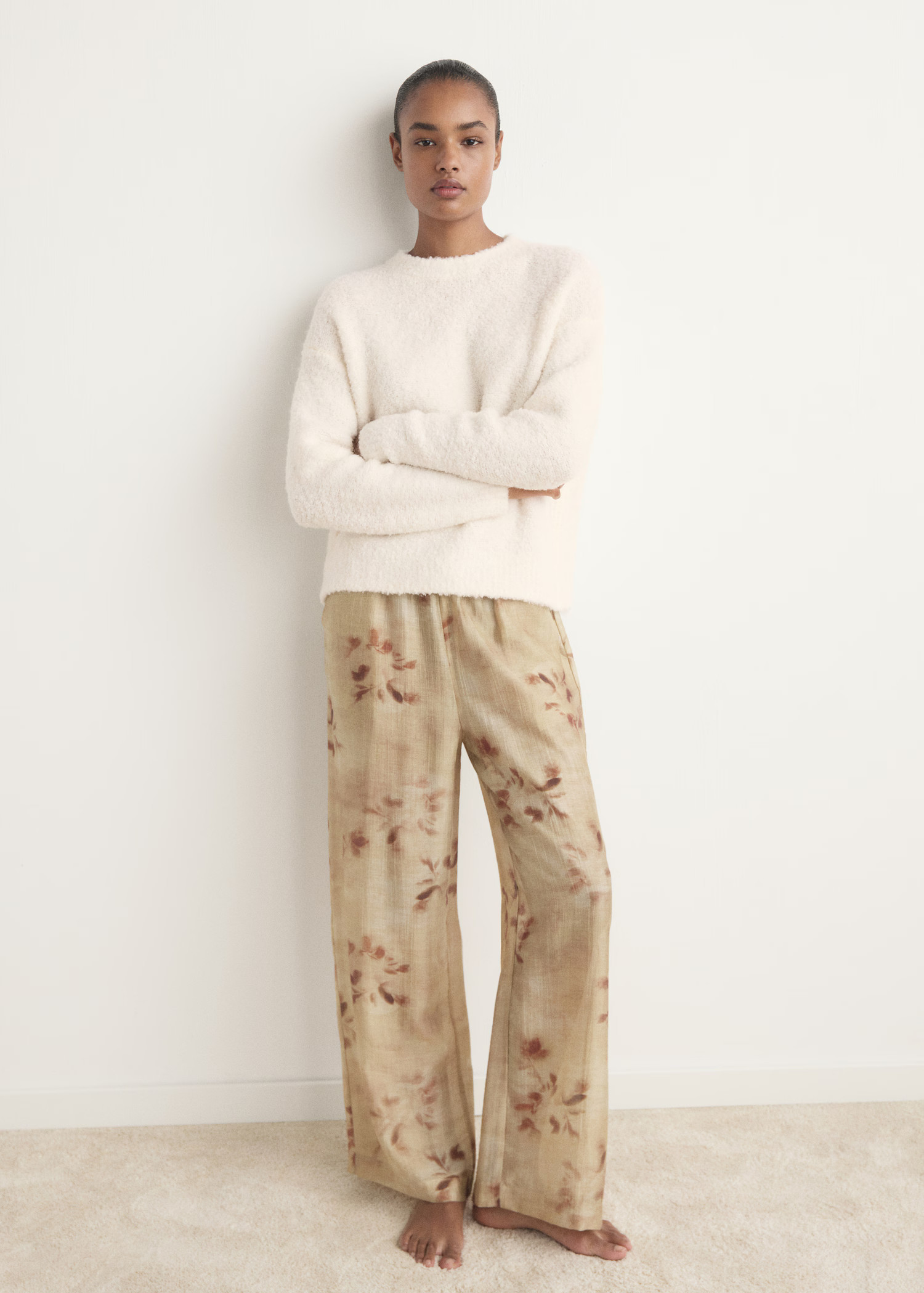 Bouclé-effect sweaterCurrent price [US$ 99.99 ]US$ 99.99Select a colourIvory White | Mango (US/MX/AU)