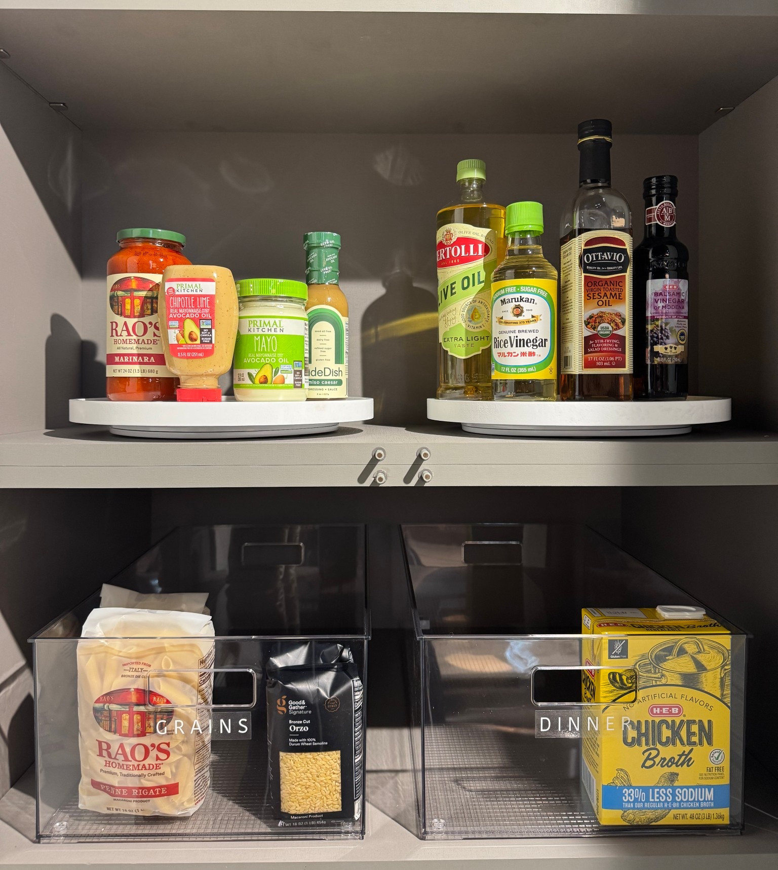 Pantry organization is never one-size-fits-all — it’s about designing for the depth of your shelves.

The upper shelf here is 12” deep, so we used 12” turntables to keep oils, vinegars, and sauces fully accessible without wasted space. The lower shelf is 20” deep, which allowed us to use deep, clear storage bins to contain pasta, grains, and dinner staples so nothing gets lost in the back.

When you match your organizers to your shelf depth, you maximize storage, improve visibility, and create a system that actually works long term. All turntables and clear pantry bins are linked.

#LTKHome