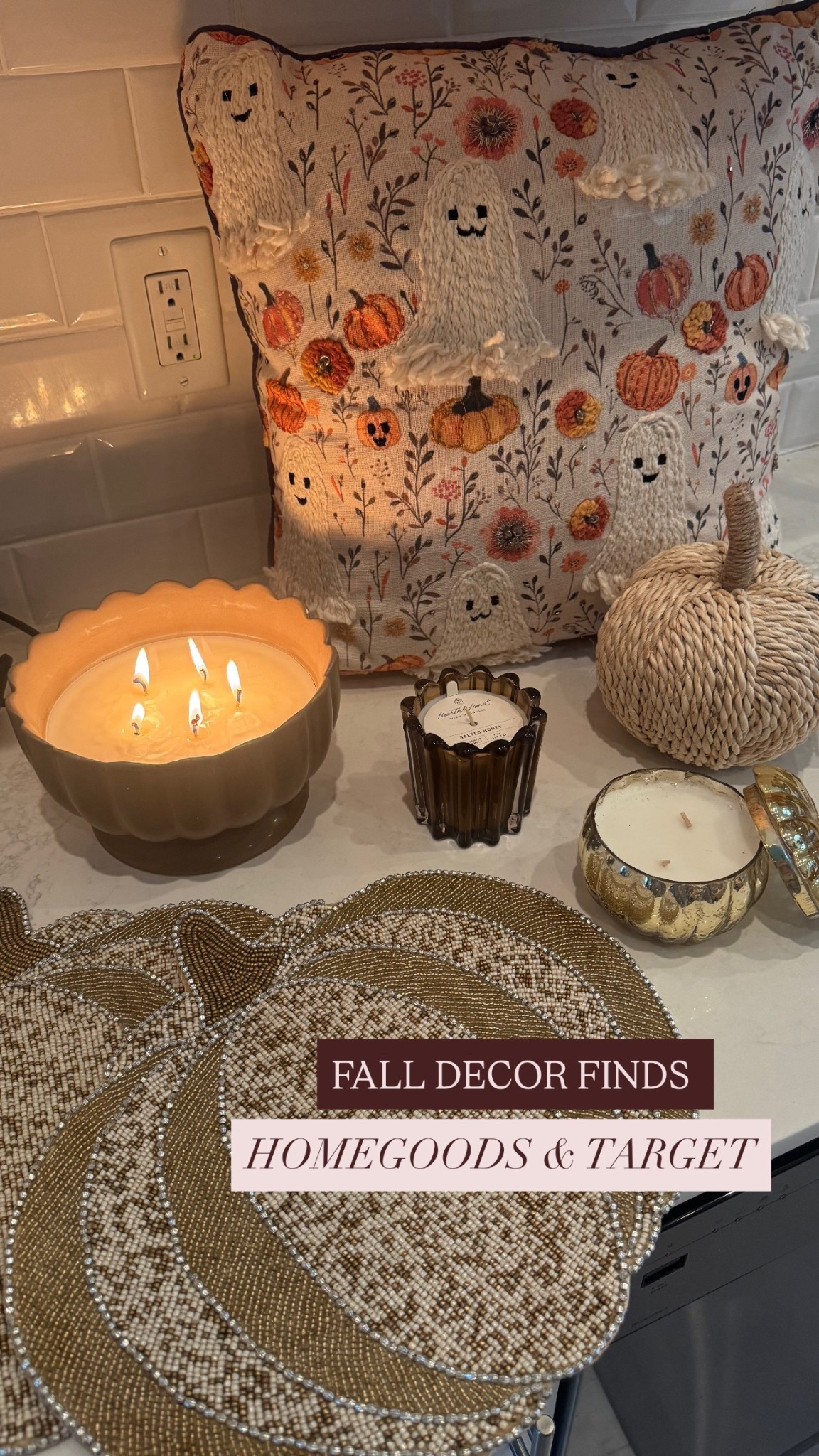 Neutral elevated Fall decor on a budget! 

Placemats: homegoods 
Gold pumpkin candle: homegoods
Ghost / pumpkin pillow: homegoods 
Straw pumpkin: homegoods 
Large candle: target 
Small brown candle: target 

#LTKSeasonal #LTKHome #LTKFindsUnder50