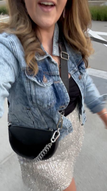 Sequin skirt and jean jacket for girls night out outfit! Great midsize style look. Cutest crossbody from Steven Madden bags (gifted).  Linking Golden Goose and save option!

Concert outfit // party outfit // fall // comfortable// casual // affordable 

#LTKSeasonal #LTKstyletip #LTKunder100