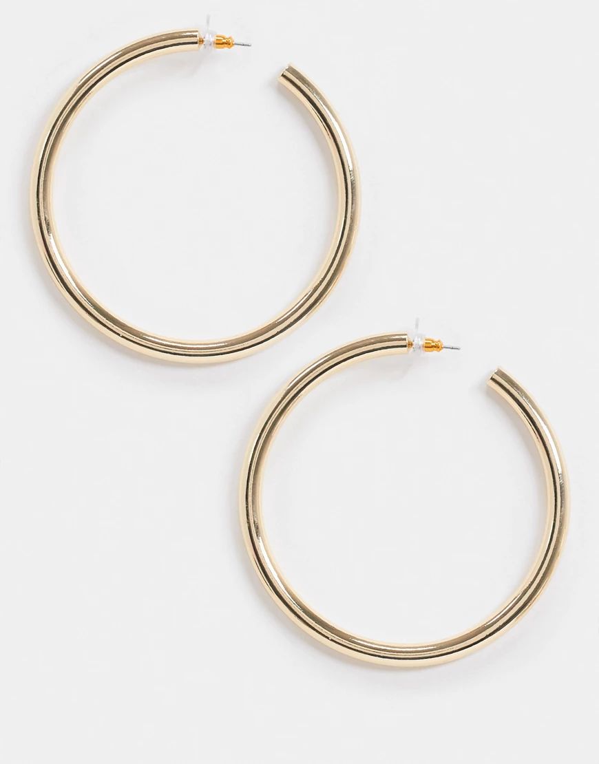 ASOS DESIGN 60mm thick hoop earrings in gold tone | ASOS (Global)