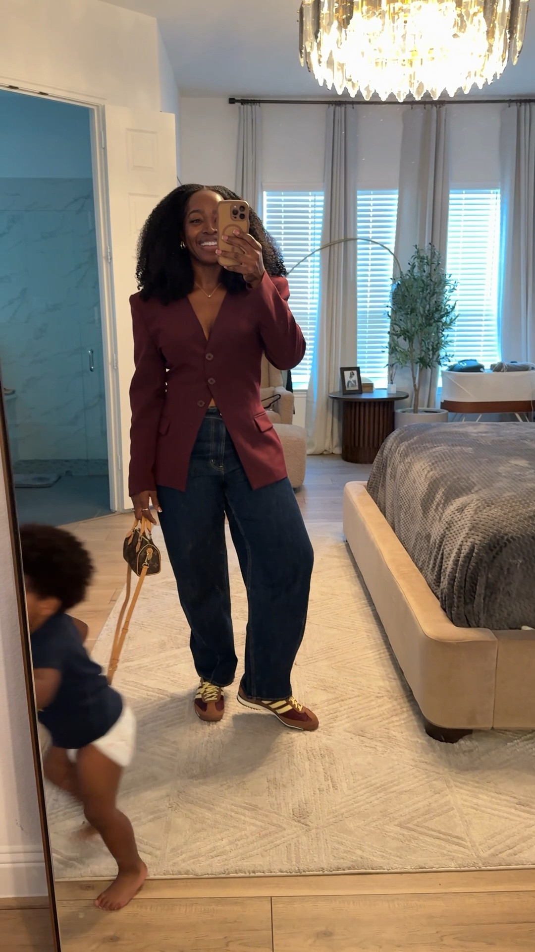 Shop my fall outfit: cinched burgundy blazer, barrel jeans and burgundy and yellow adidas 🫶🏾 I’m wearing a size 8 in the blazer and a size 30 in the  jeans. 💕

#LTKStyleTip #LTKMidsize #LTKU
