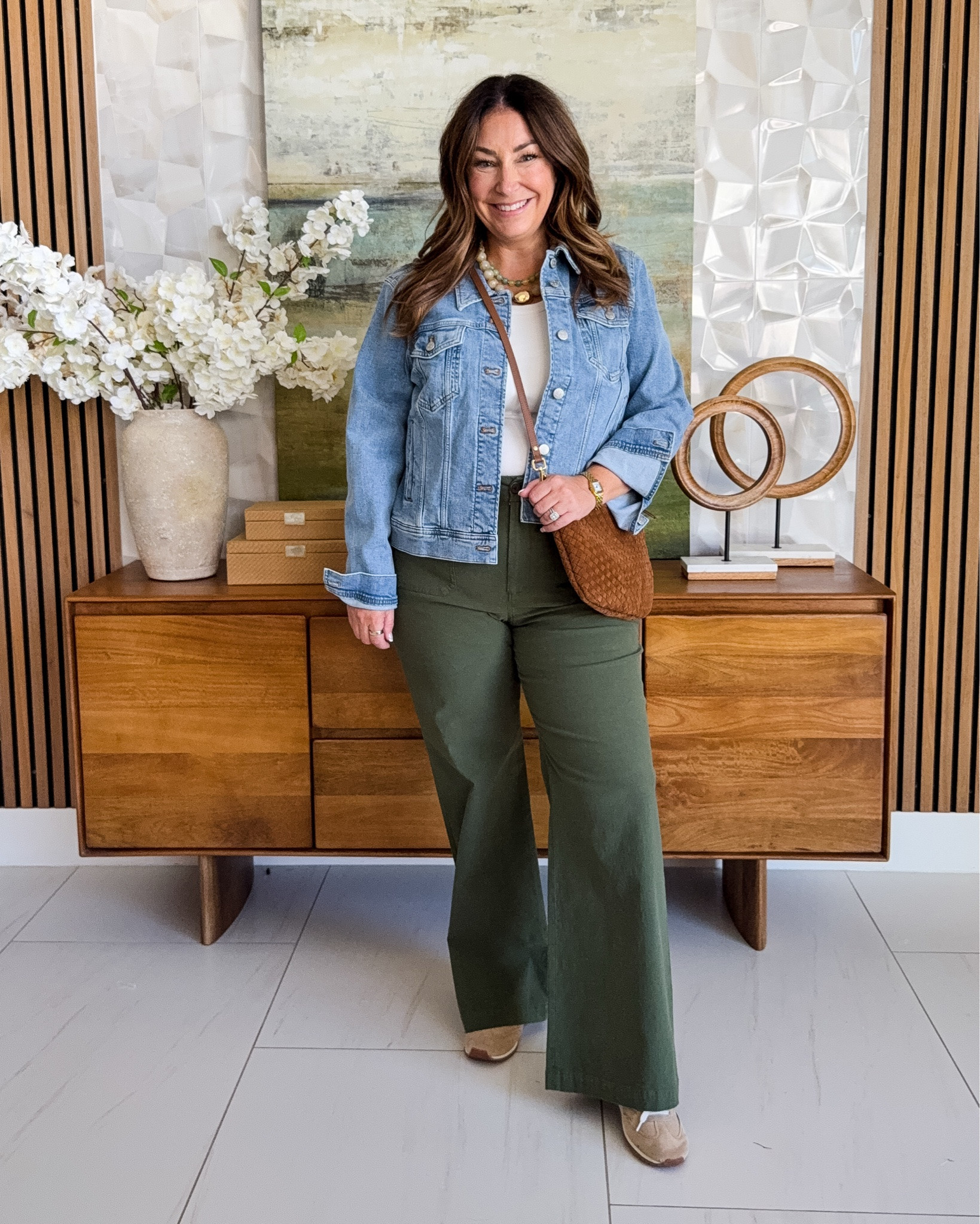 Casual fall outfit 🫒 Light wash denim jacket over a white tank, paired with olive green wide-leg pants, a brown woven crossbody, and tan sneakers. An easy, everyday casual look for errands, weekends, and school pickup.

Sizing: pants run small wearing 12 prefer 14 // tank tts, L // Jacket, L 

@jcrewfactory

#LTKSeasonal #LTKOver40 #LTKMidsize