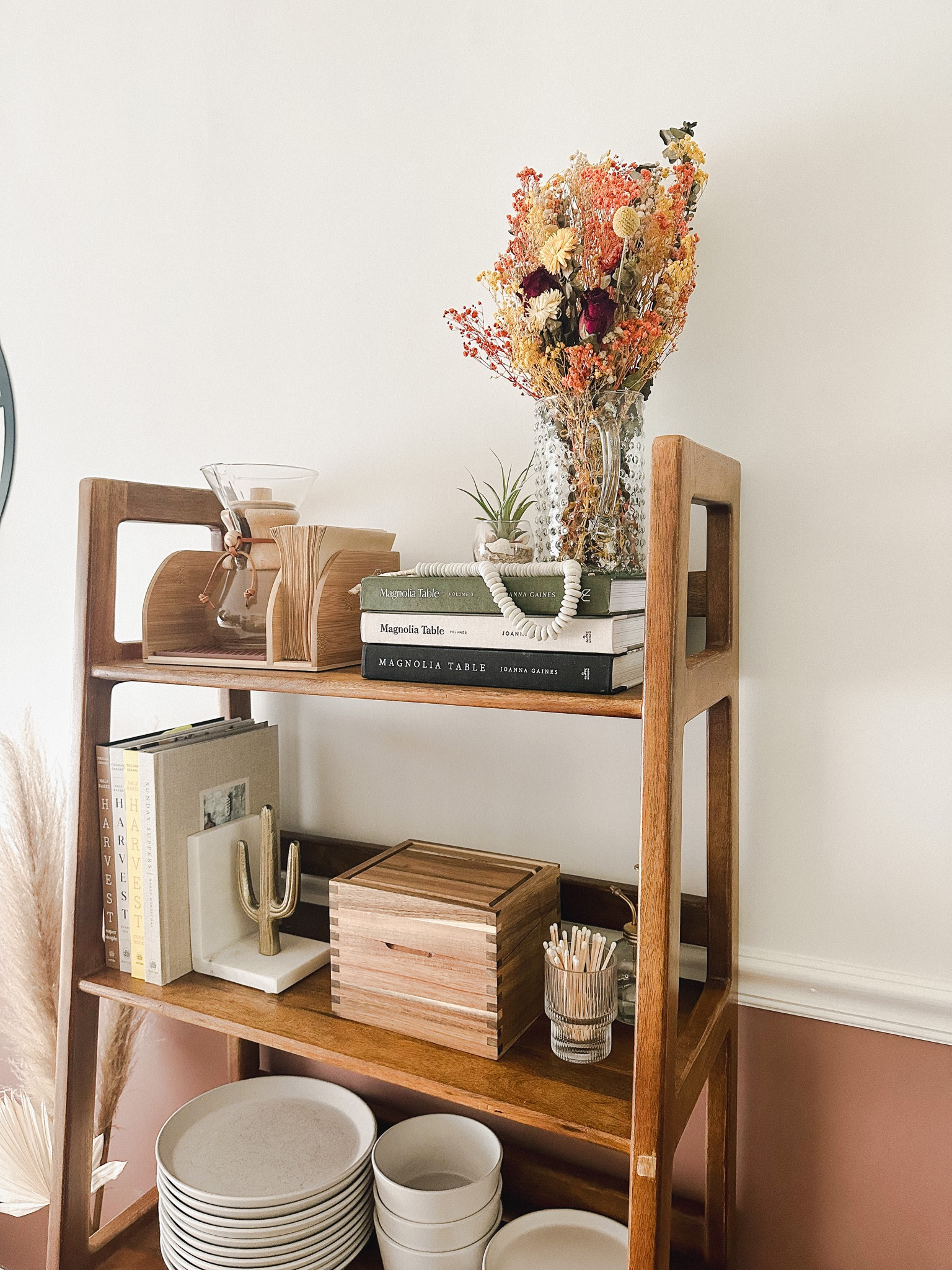 Pretty and practical shelf decor 
Cookbooks and dried flowers 

#LTKhome #LTKunder50