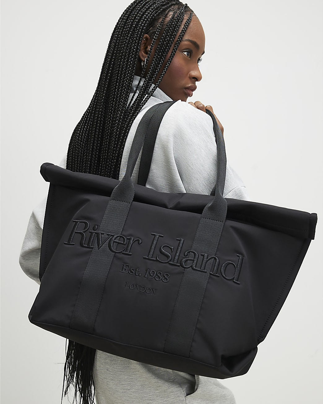 Black RI Roll Top Holdall Bag | River Island UK & IE