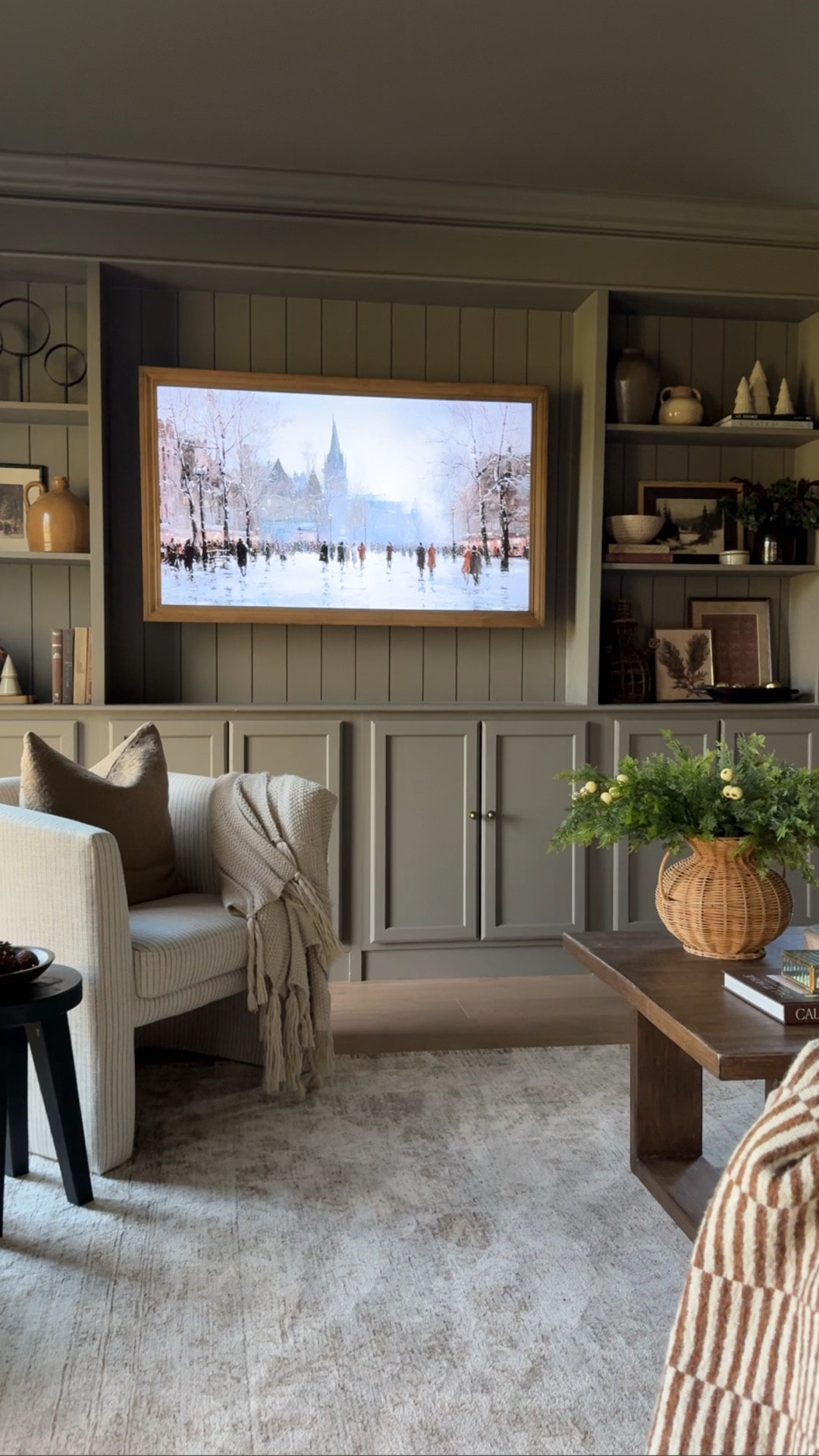 Living room | media room | bonus room | built in shelves | shelf styling | winter art prints | coffee table | target finds | studio McGee chair | woodland stool | Christmas tree 

#LTKHome #LTKFindsUnder50 #LTKSaleAlert