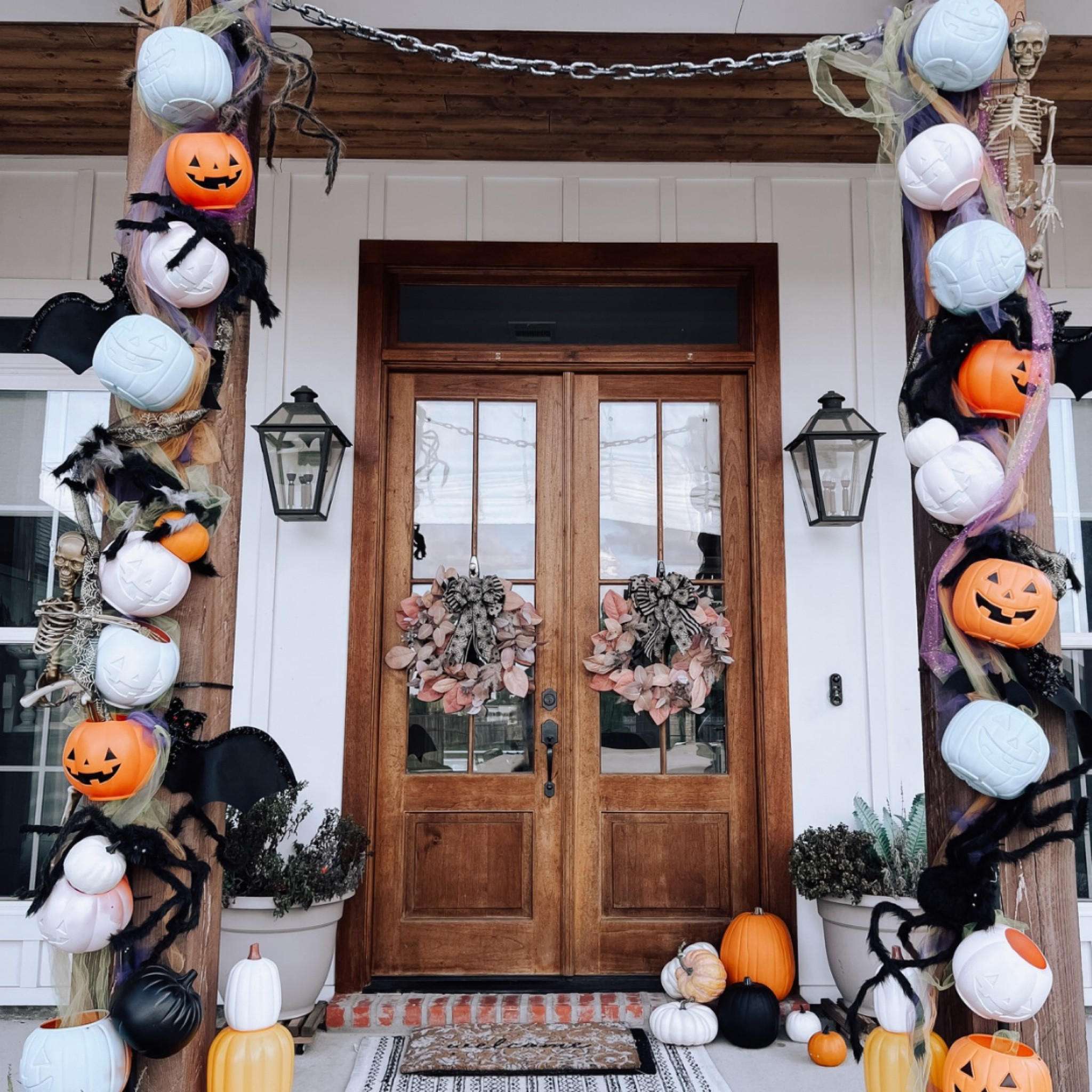 When the pumpkins come out to play, you make a front porch arch 🧡🎃🦇🖤 

It is truly really simple! I purchased plastic pumpkin baskets, removed the handles, and drilled 2 small holes in the back to thread the zip ties through for attaching to pvc pipes. Spray painted pvc pipes and pumpkins ( and I obviously don’t do this for perfection 😂). Add in fillers like skeletons, burlap/tulle, spiders, etc! 

#LTKHome #LTKSeasonal #LTKHalloween