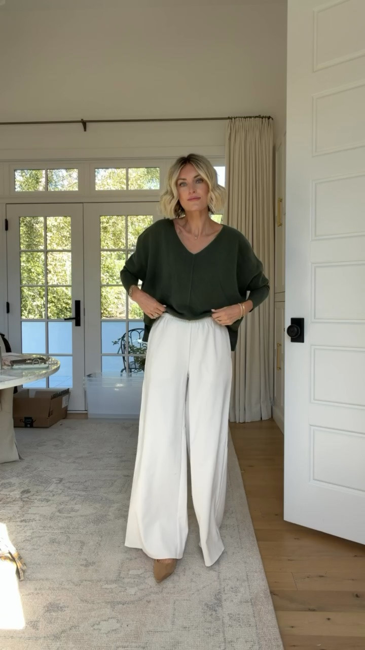 Really love buying cashmere pieces at Anthropologie! Not only is the fabric great, but the cuts and silhouettes are so well done, and I paired the sweater with affordable Target pants! Wearing XS in both

Loverly grey, green cashmere v neck sweater, white pull on pants, fall outfit ideas, fall fashion inspo