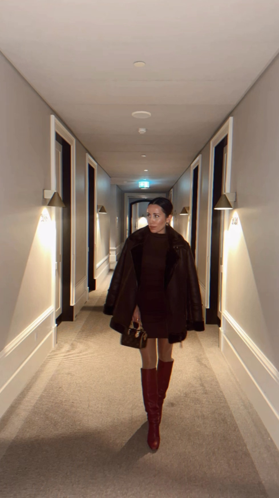 Saturday date night in Copenhagen with friends in this tonal brown on brown look with pop of red burgundy boots and my new little baby 👜

Coat: Stradivarius
Dress: Stradivarius
Boots: Don’t know - but linking ones I’m upgrading to! 
Nylons: Calzedonia
Bag: Louis Vuitton Mini Speedy

#LTKStyleTip #LTKItBag #LTKTravel