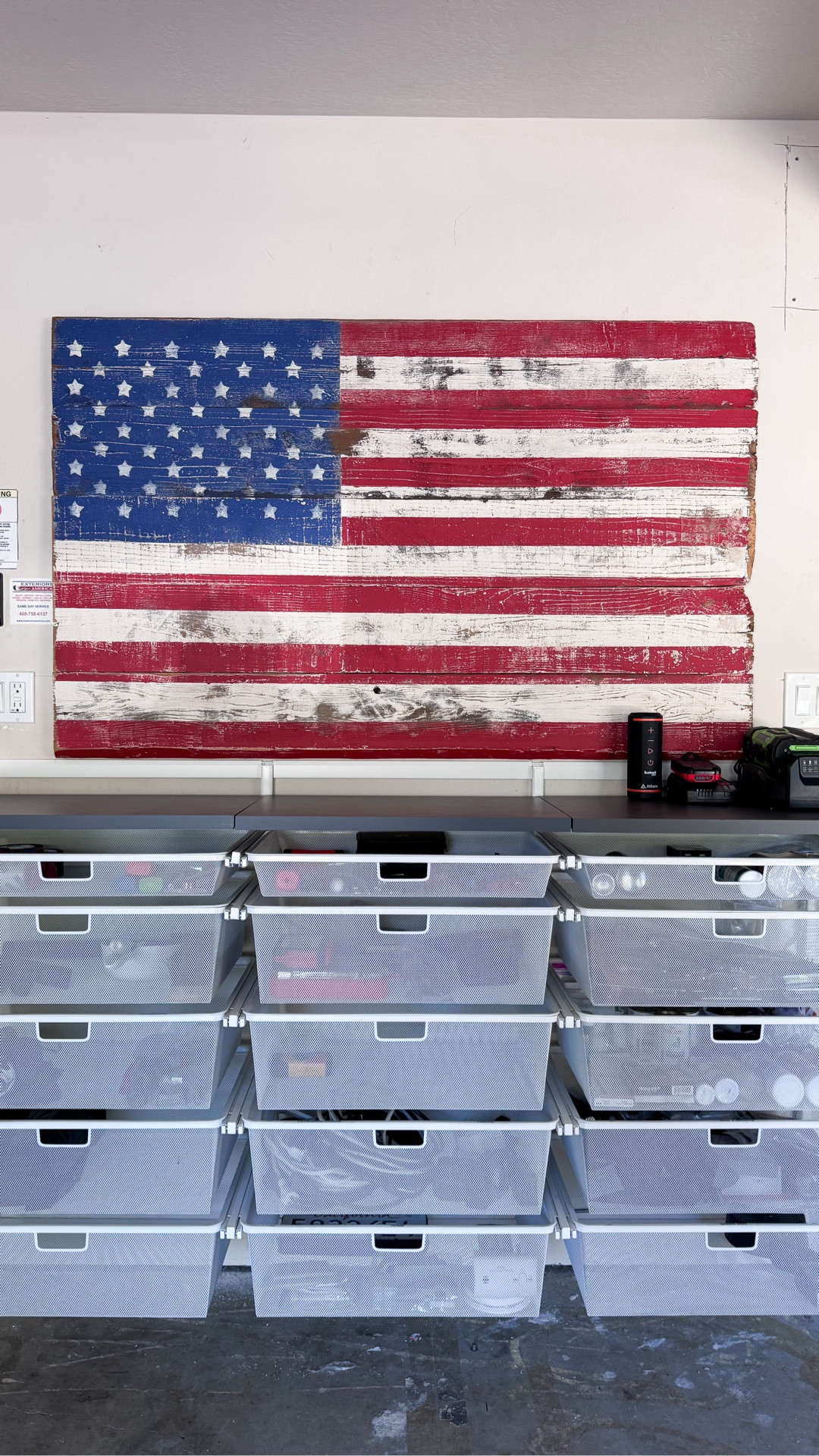Working my way through this garage and I am 99% done with this wall! I’m going to raise the American flag decor wall hanging just a bit to give the wall a little more balance and space between the two. I’m moving onto the utility track wall and then into the gym section of this garage and I will wrap it up by the weekend. Can’t wait to share more!

#LTKHome #LTKFamily