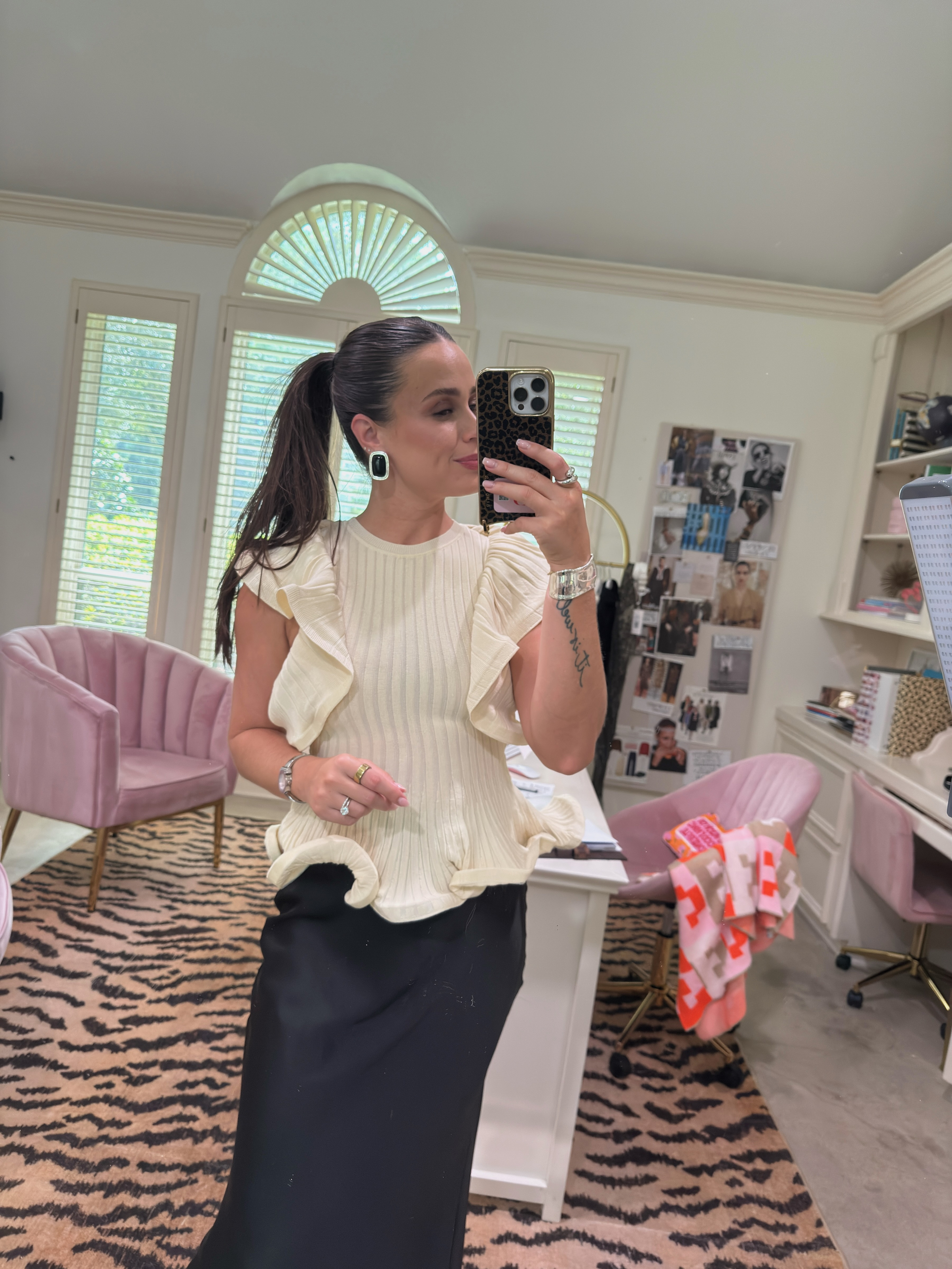 Ivory ruffle top + black maxi skirt = the outfit that looks like way more effort than it was. The ruffle sleeve does all the personality-work so the rest can stay quiet — one statement earring and you're out the door. Zara really said "expensive taste, budget price" with this one. 🖤 

 #LTKdayinmylife #LTKgrwm #LTKootd
