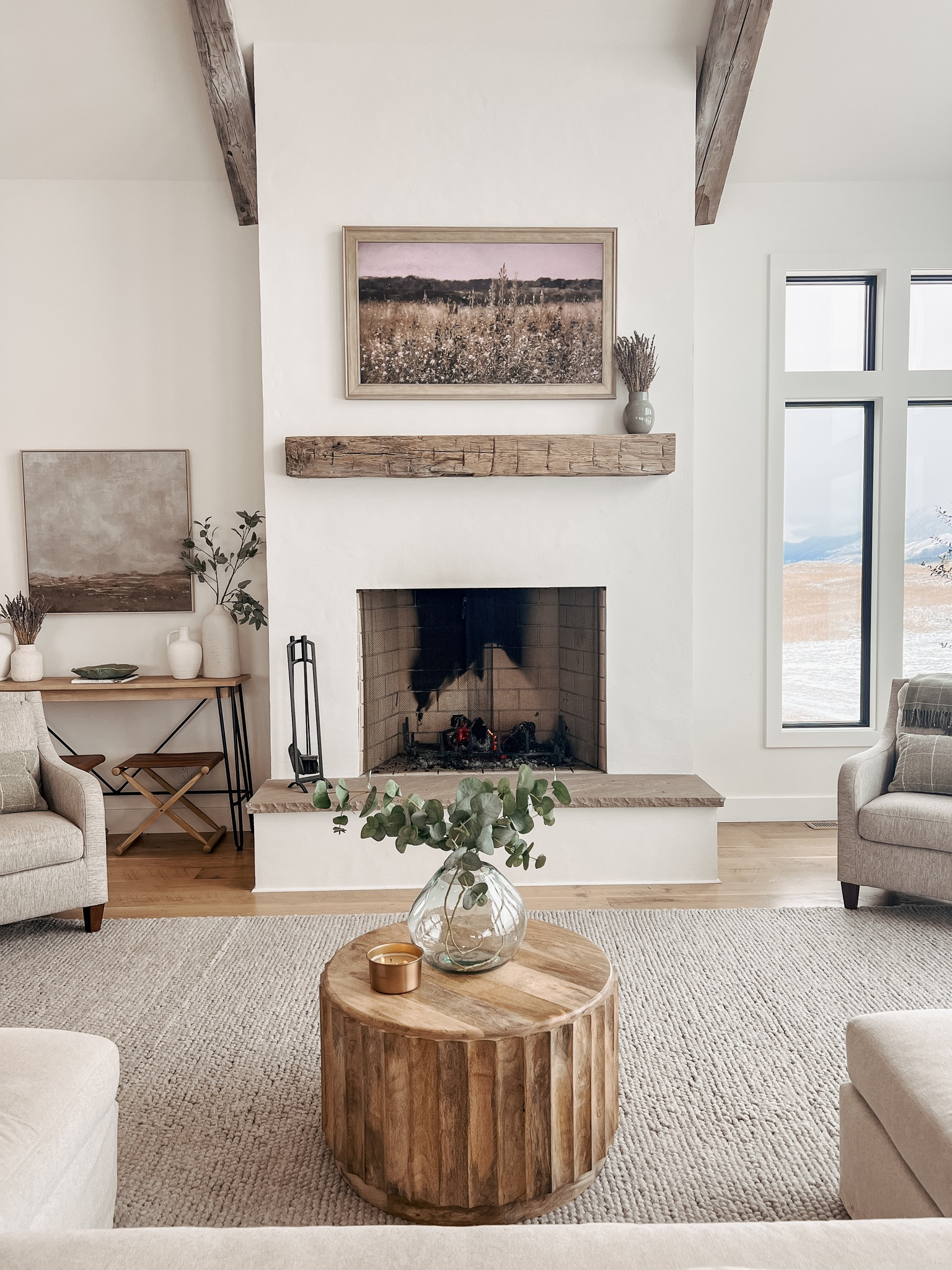 European plaster fireplace with modern decor

Samsung TV 
Deco TV frame
Target finds 
Console table 
Round coffee table 
Glass vase 
Accent chairs 
Lavender vase
Double chaise sofa 

#LTKHome