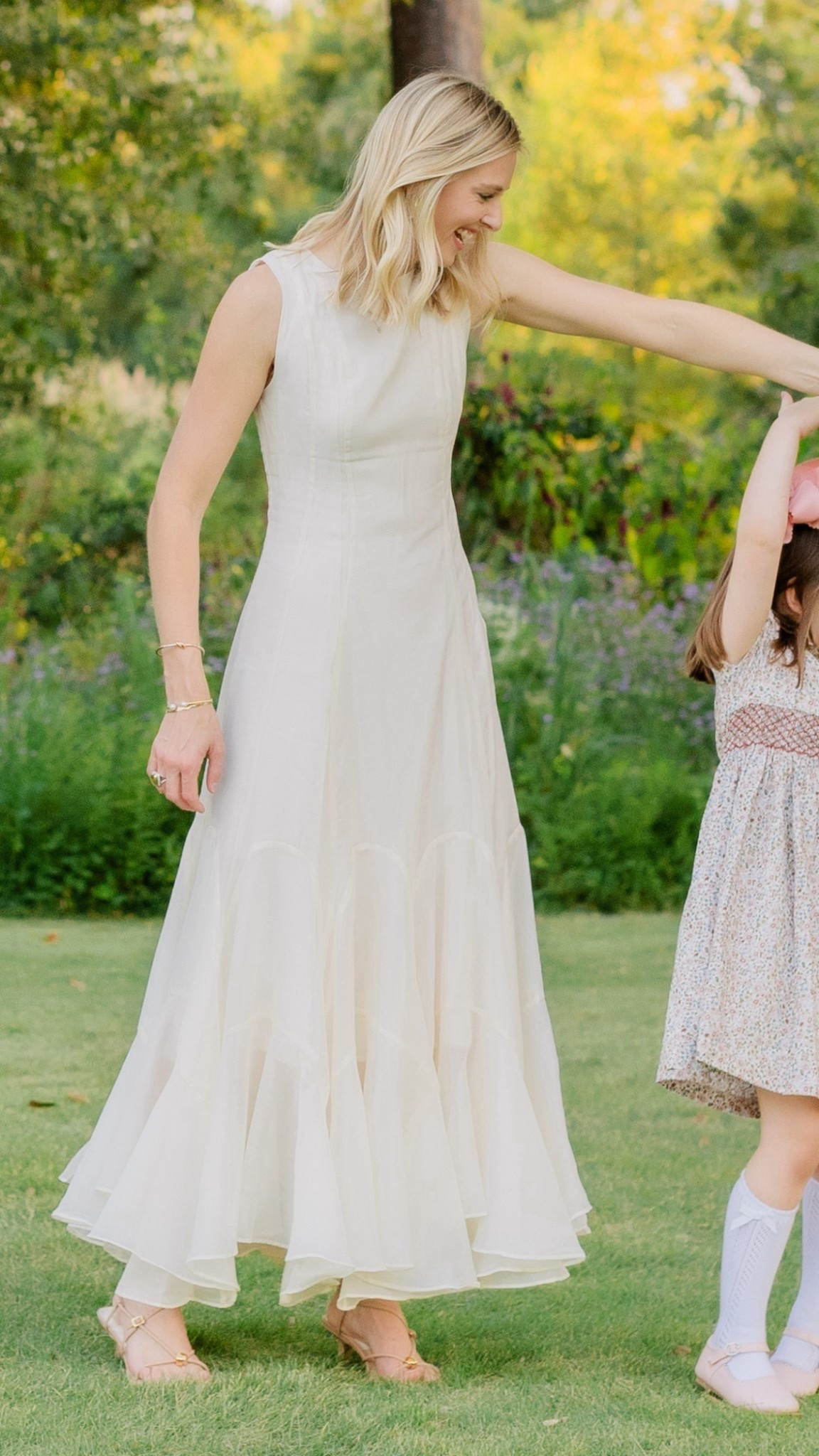 What I wore for family photos! Dress is under $150 & currently on sale for $112!! Love the classic silhouette, but has great movement for photos. Linked what my girls wore too!