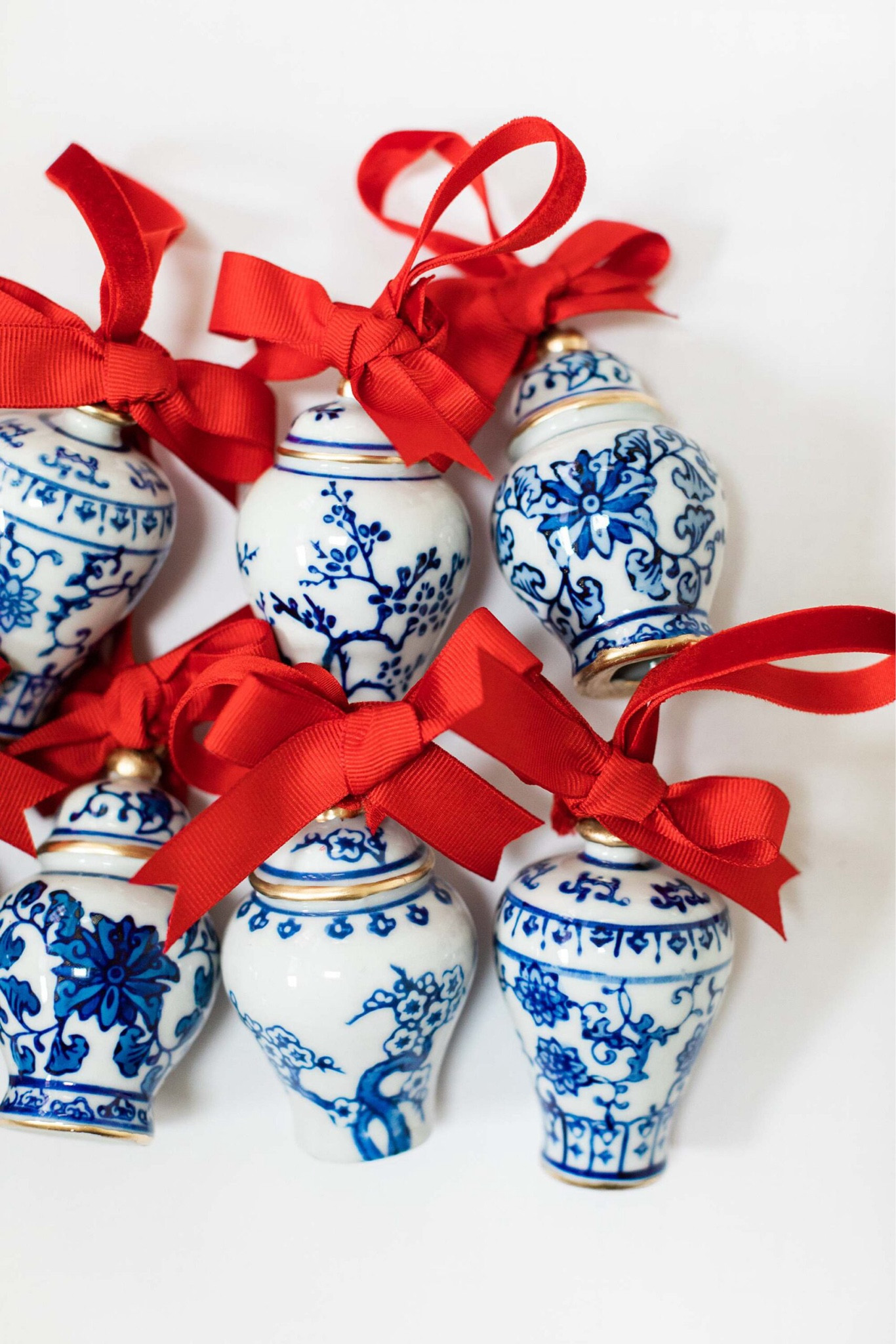 Blue and white Ginger jar ornaments - see of 4 for $18 or under and embellished with gold pen and ribbon! 

Grandmillennial style Christmas ornaments 

#LTKHoliday #LTKSeasonal #LTKGiftGuide