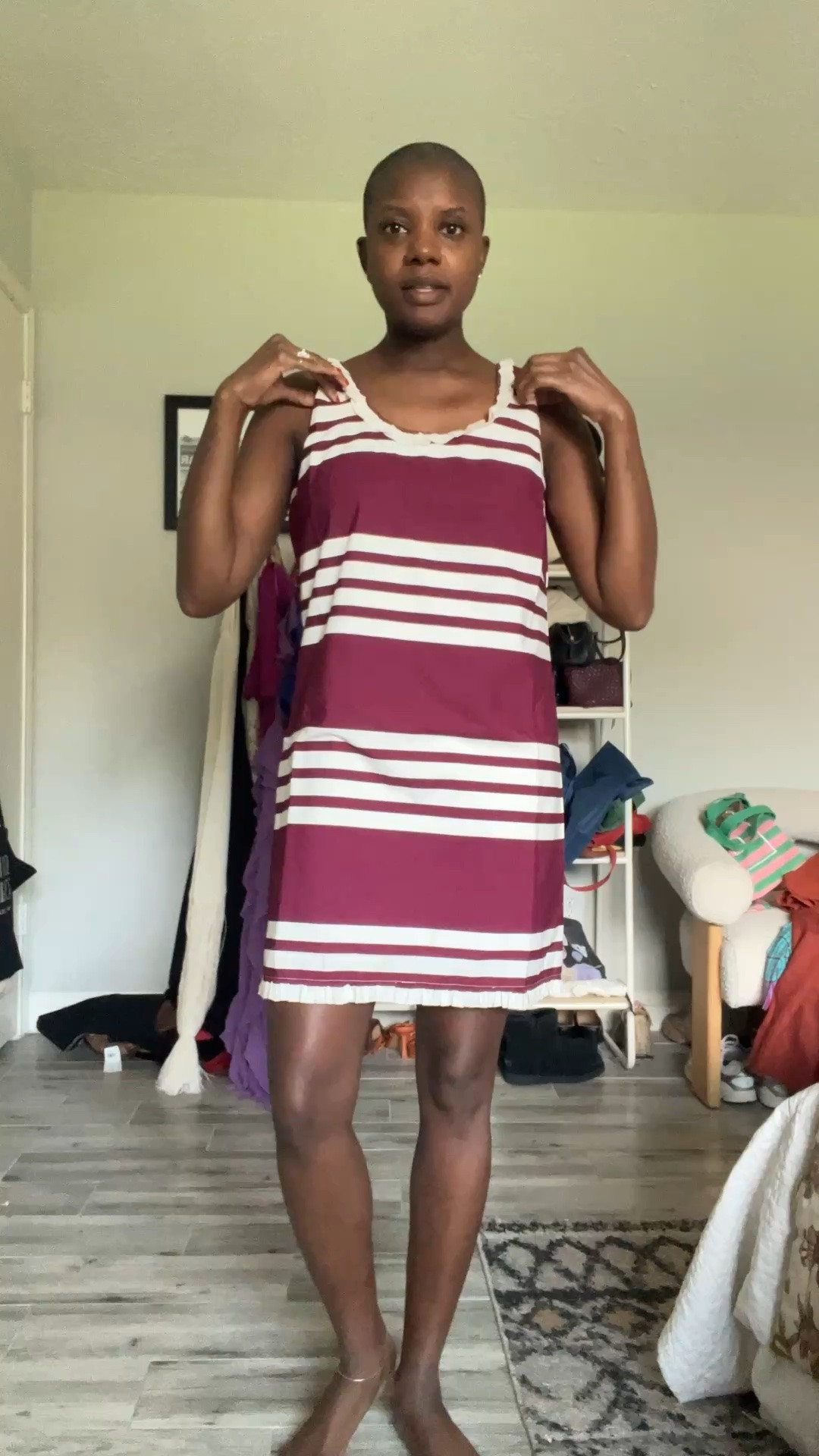 Striped Ruffle scoop neck mini dress. 100% cotton,  no stretch and I’m wearing a size small.

#LTKdayinmylife #LTKootd #LTKgrwm
