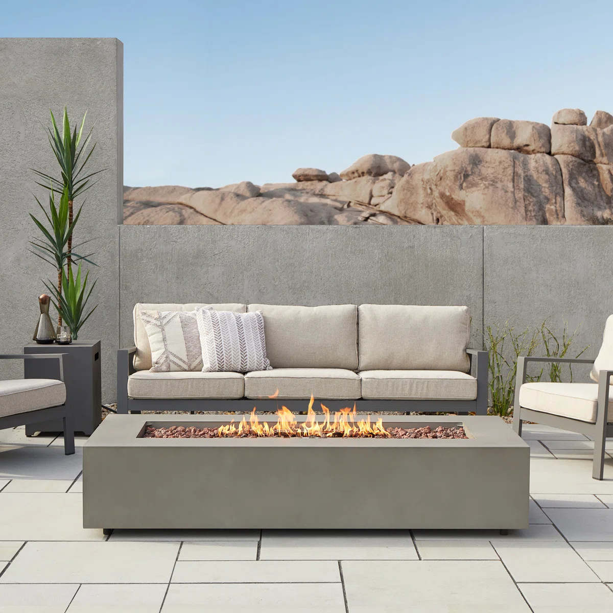 The fire pit table is a welcome addition to most outdoor living spaces. Adding warmth and a relax... | Wayfair North America