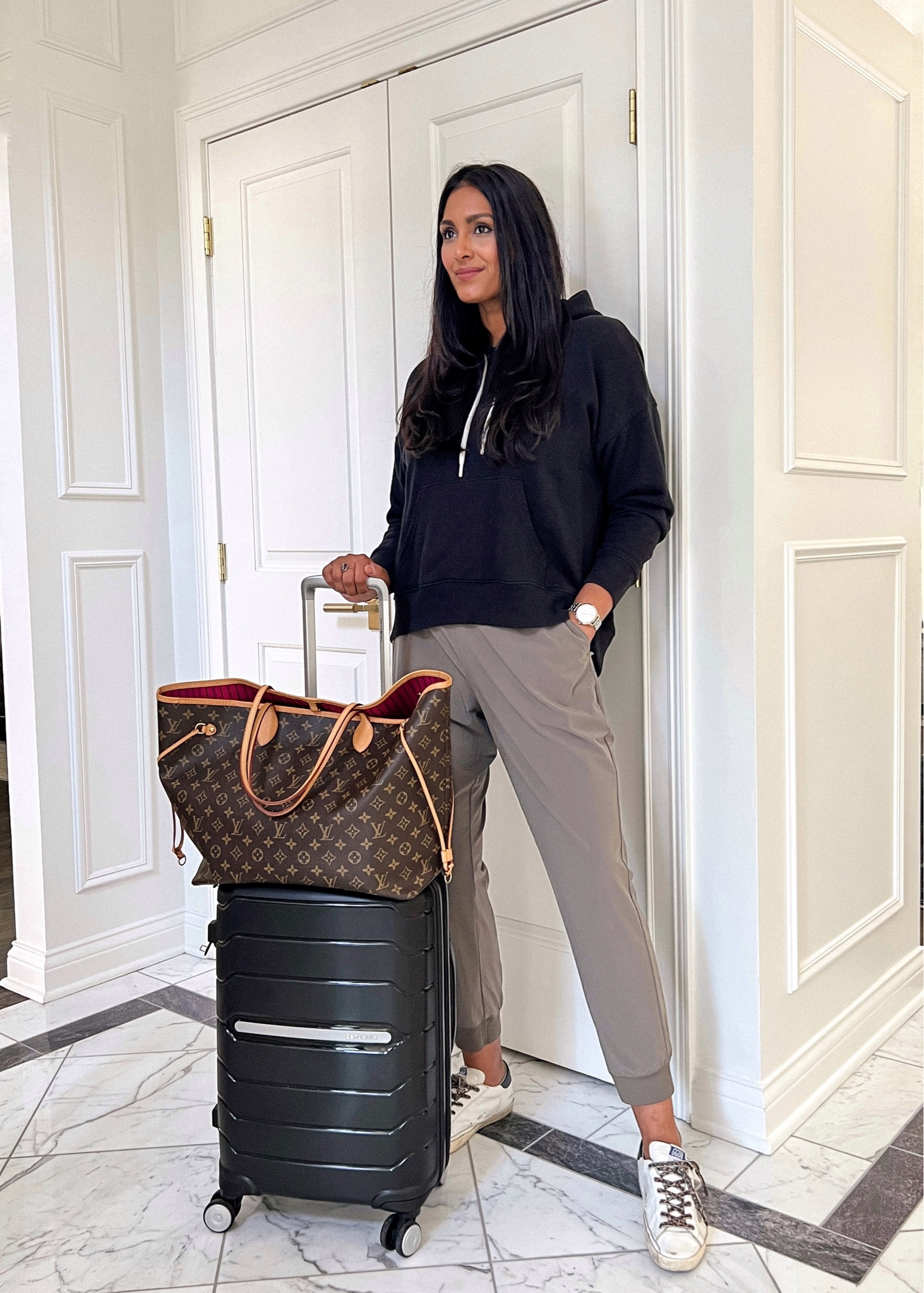 Travel outfit inspo. Banana Republic flyweight joggers. Black sweatshirt. Golden goose. Louis Vuitton Neverfull tote. 

#LTKtravel #LTKunder100 #LTKstyletip