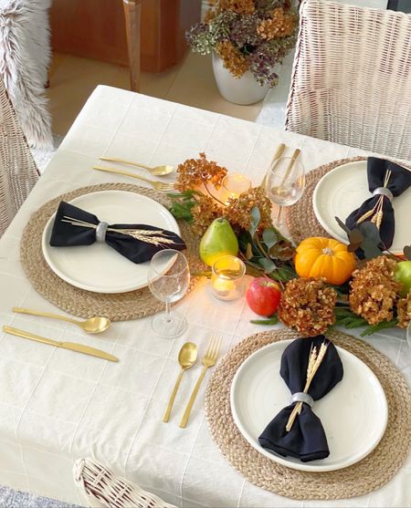 Thanksgiving table setting, plates, napkins, napkin ring, gold flatware, pine garland

#LTKhome #LTKHoliday #LTKSeasonal