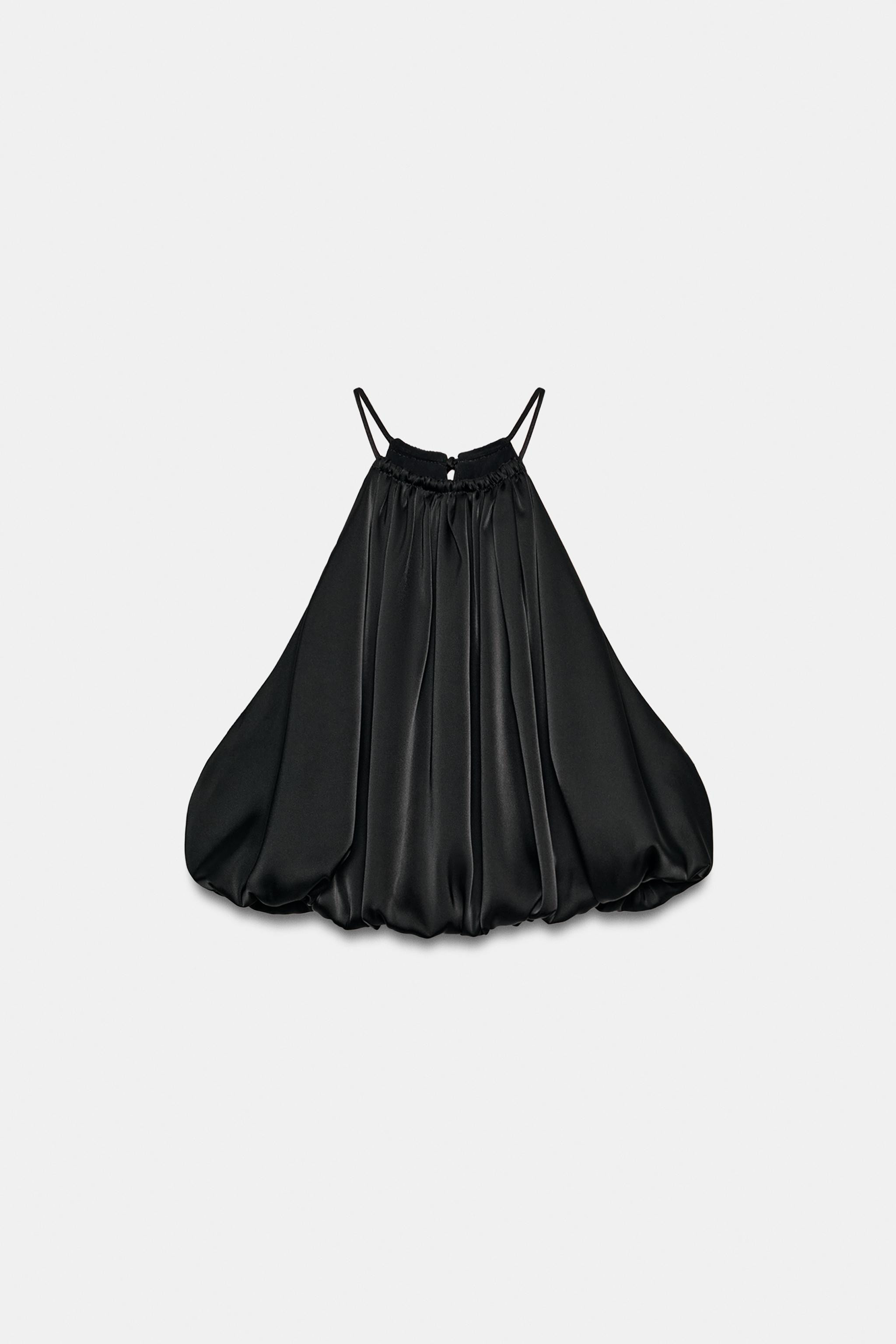 Model height: 175 cmTop crafted from satin fabric. Halter neckline with gathering detail. Featuri... | Zara UK