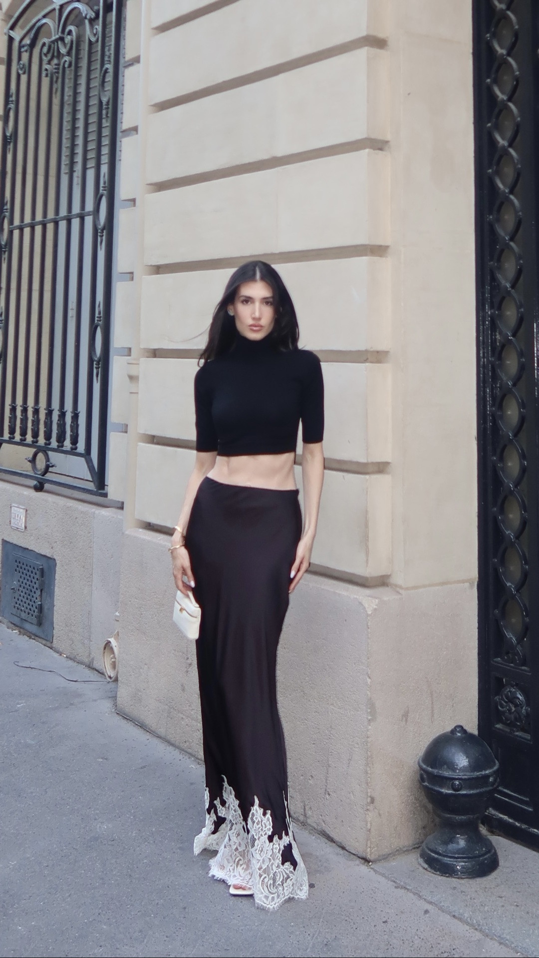 Chic black & white outfit 🤍 Wearing the viral @Meshki US  lace maxi skirt with a fitted mock-neck top and minimal accessories.

#LTKU #LTKootd #LTKSeasonal