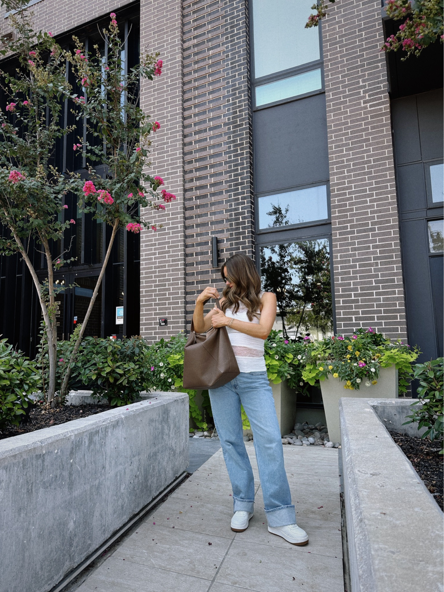 OOTD 🤎 stepping out in my favorite baggy jeans. I sized up for the bump. Wearing small in the top & wearing my new bag I love for fall! 

#LTKBump #LTKStyleTip #LTKItBag