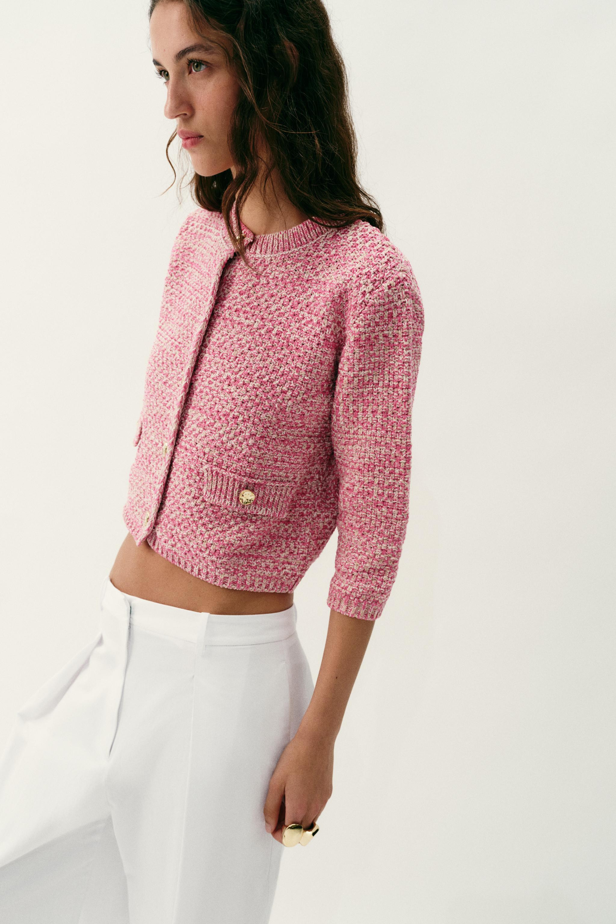 Round neck jacket with sleeves below the elbow. Front flaps. Front button closure. | Zara US