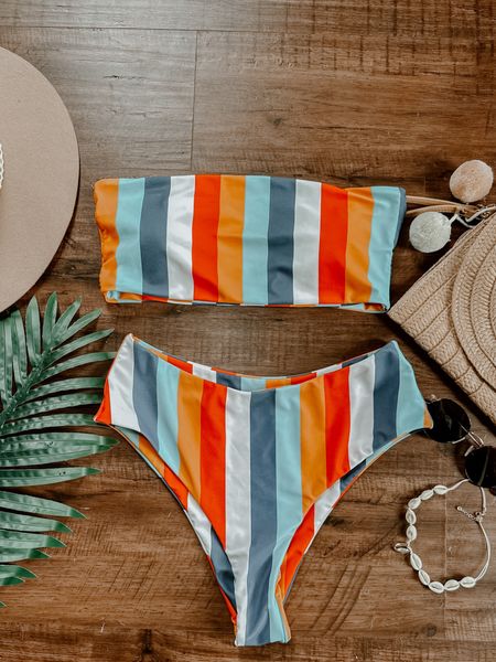 Colorful stripe two piece bathing suit. Colorful stripe two piece swimsuit. Amazon colorful bikini bandeau. Fits TTS and has stretch. Cheeky + high waist fit on bottom. 

#LTKSeasonal #LTKswim #LTKtravel