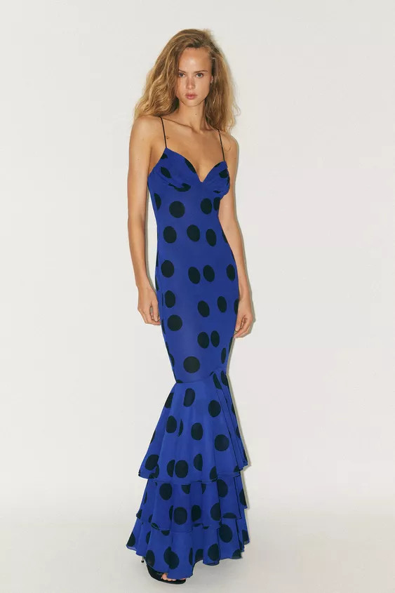 V-neck long dress with thin straps. Featuring gathered detail on the chest, lining and a hem fini... | Zara UK